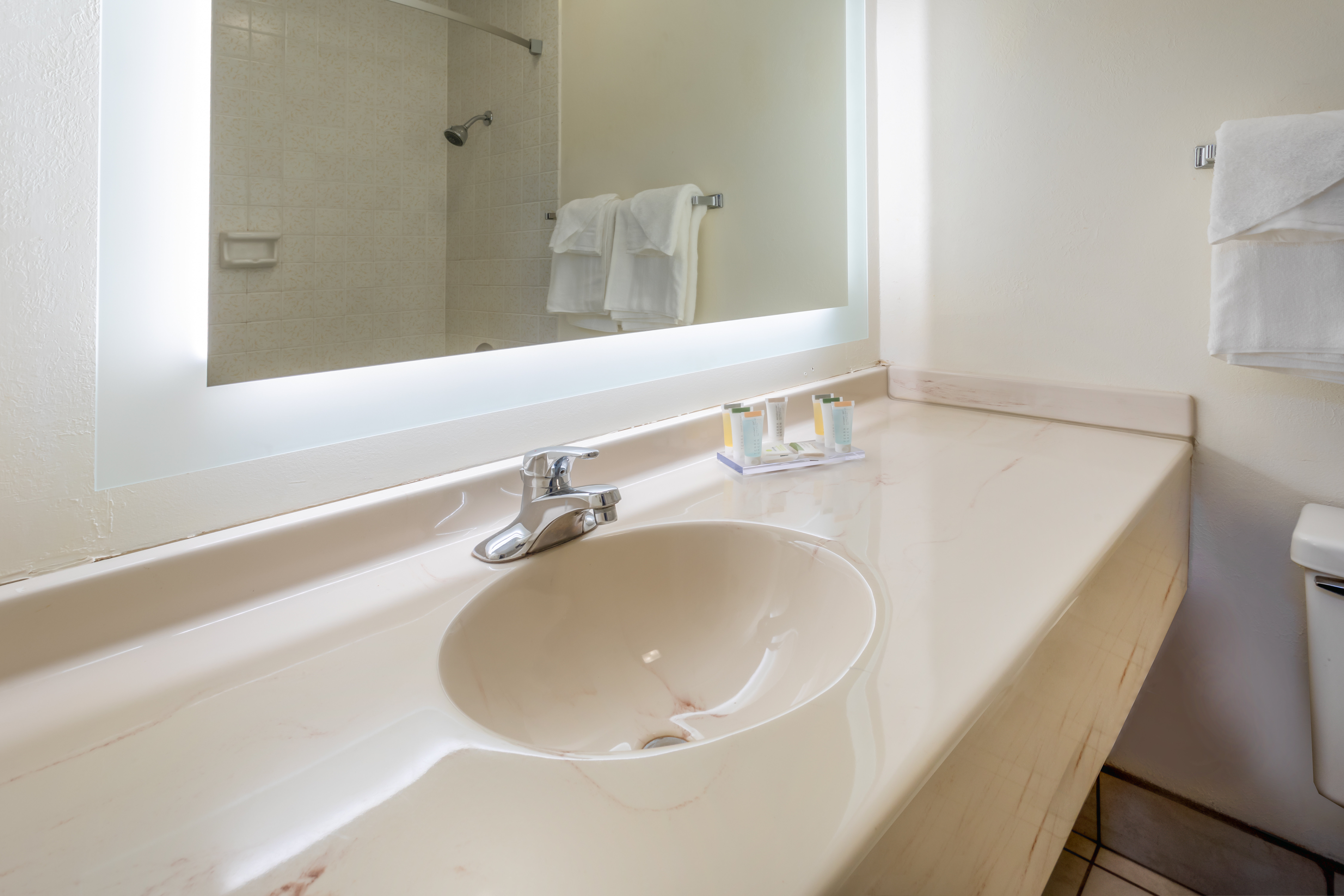 Guest room bath at the Super 8 by Wyndham Wooster in Wooster, Ohio