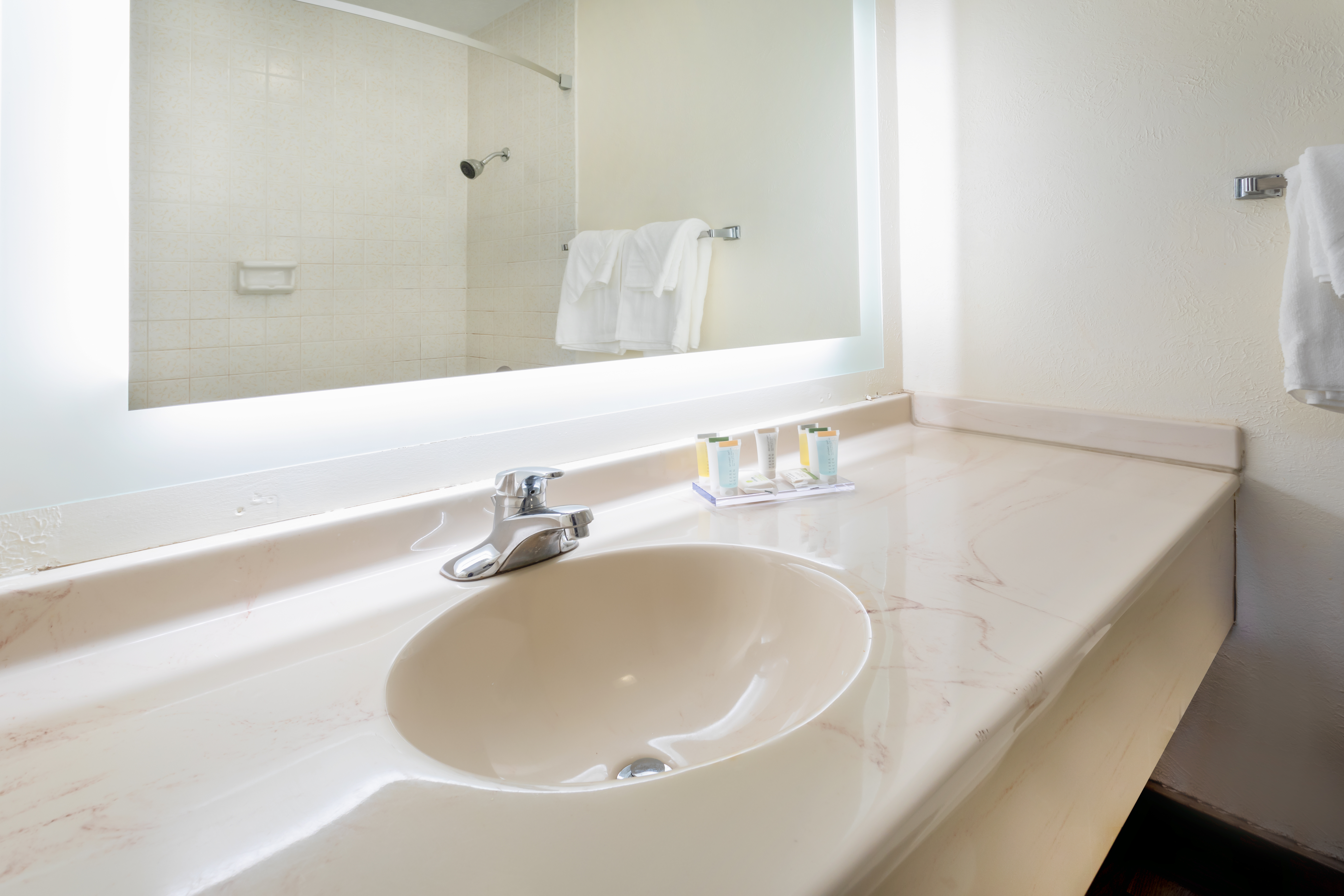 Guest room bath at the Super 8 by Wyndham Wooster in Wooster, Ohio