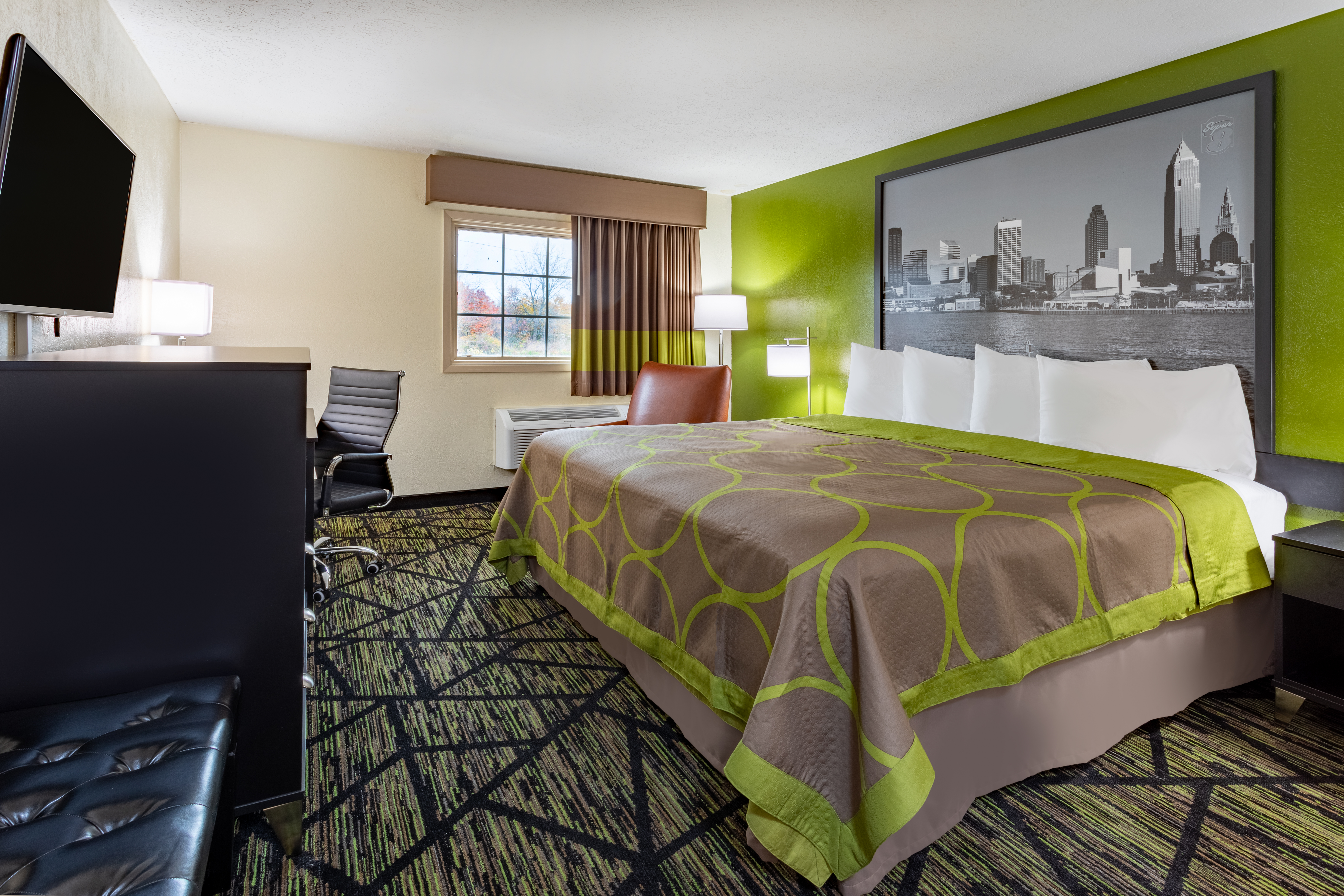 Guest room at the Super 8 by Wyndham Wooster in Wooster, Ohio