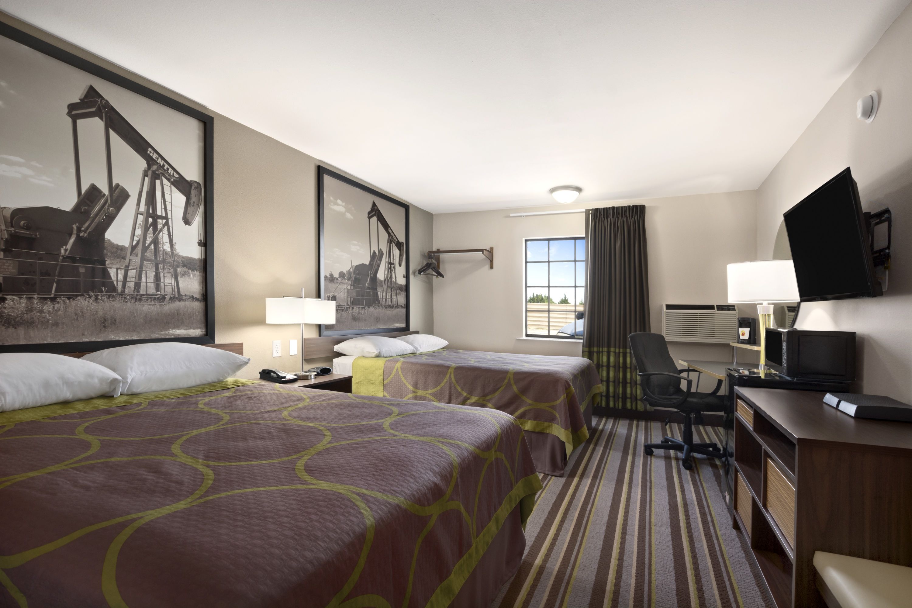 Guest room at the Super 8 by Wyndham Ardmore in Ardmore, Oklahoma