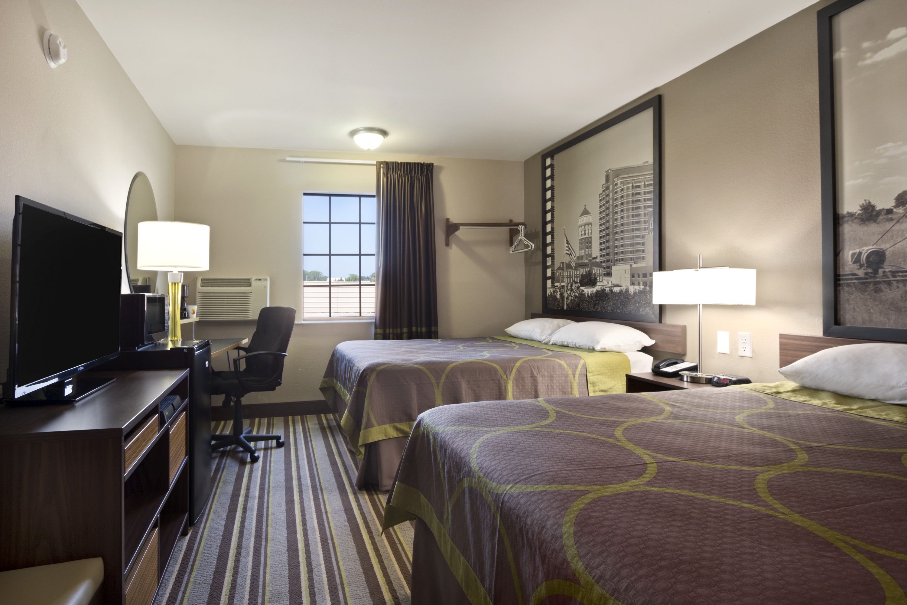 Guest room at the Super 8 by Wyndham Ardmore in Ardmore, Oklahoma