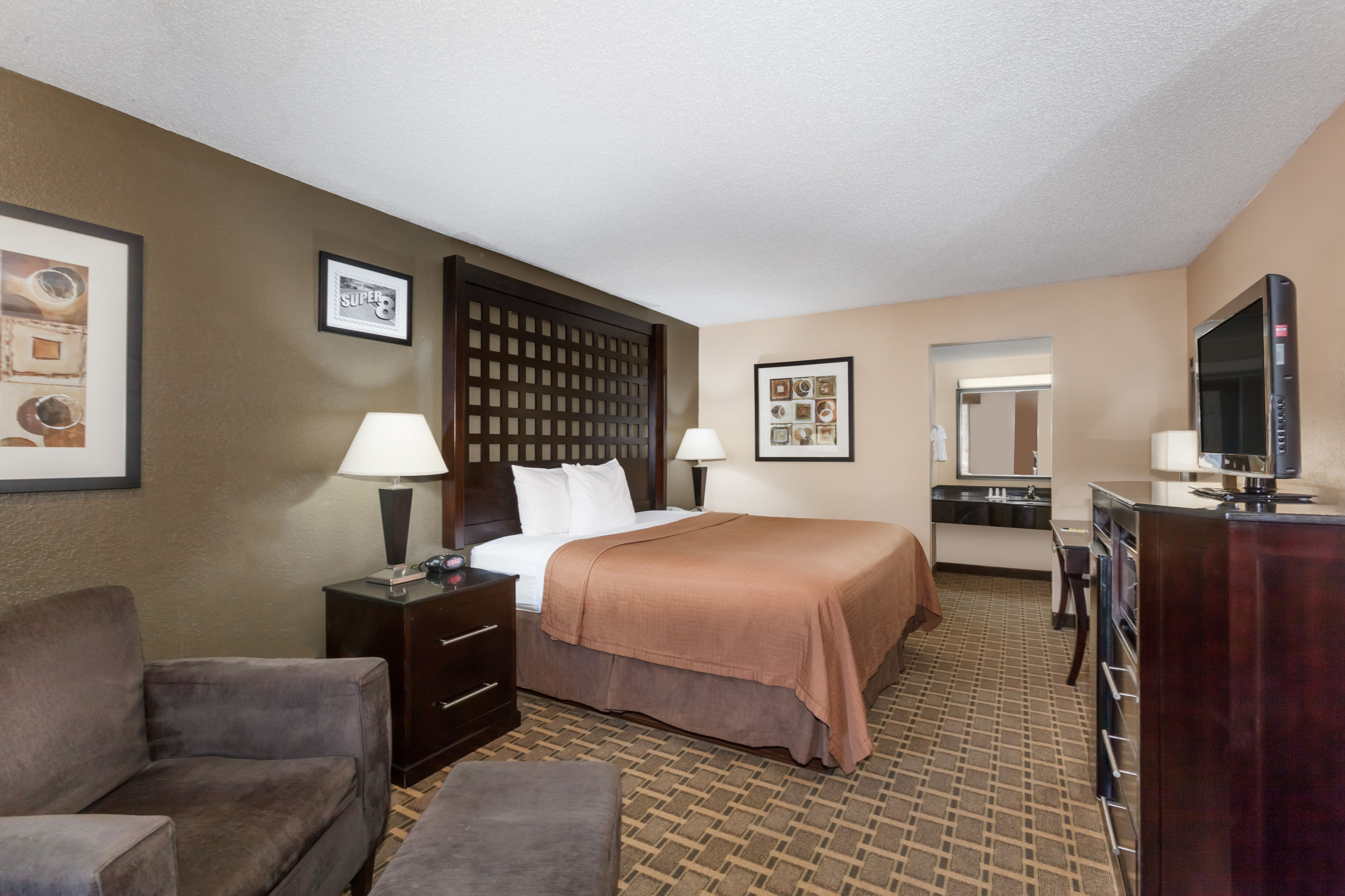 Guest room at the Super 8 by Wyndham Atoka in Atoka, Oklahoma