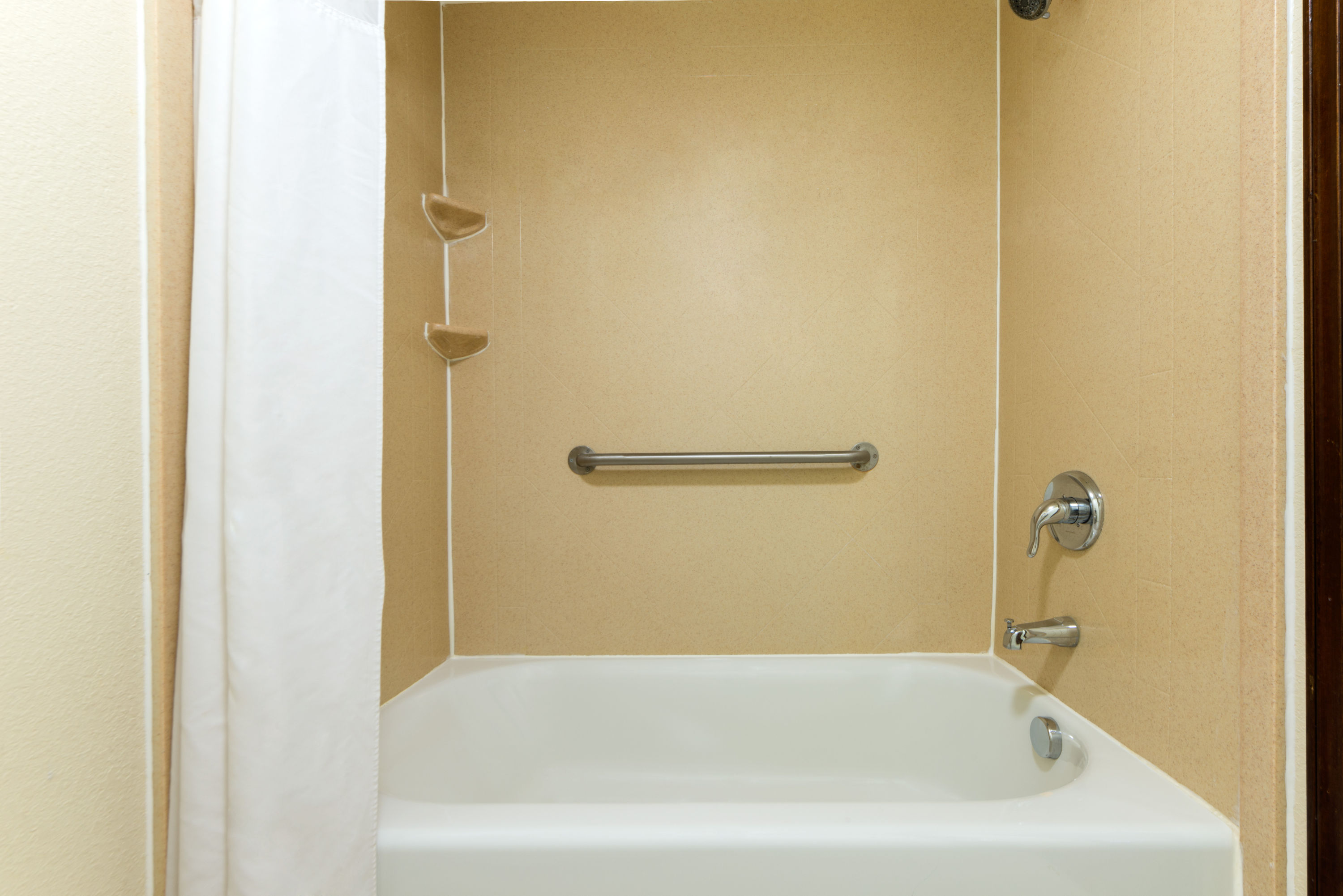 Guest room bath at the Super 8 by Wyndham Enid in Enid, Oklahoma