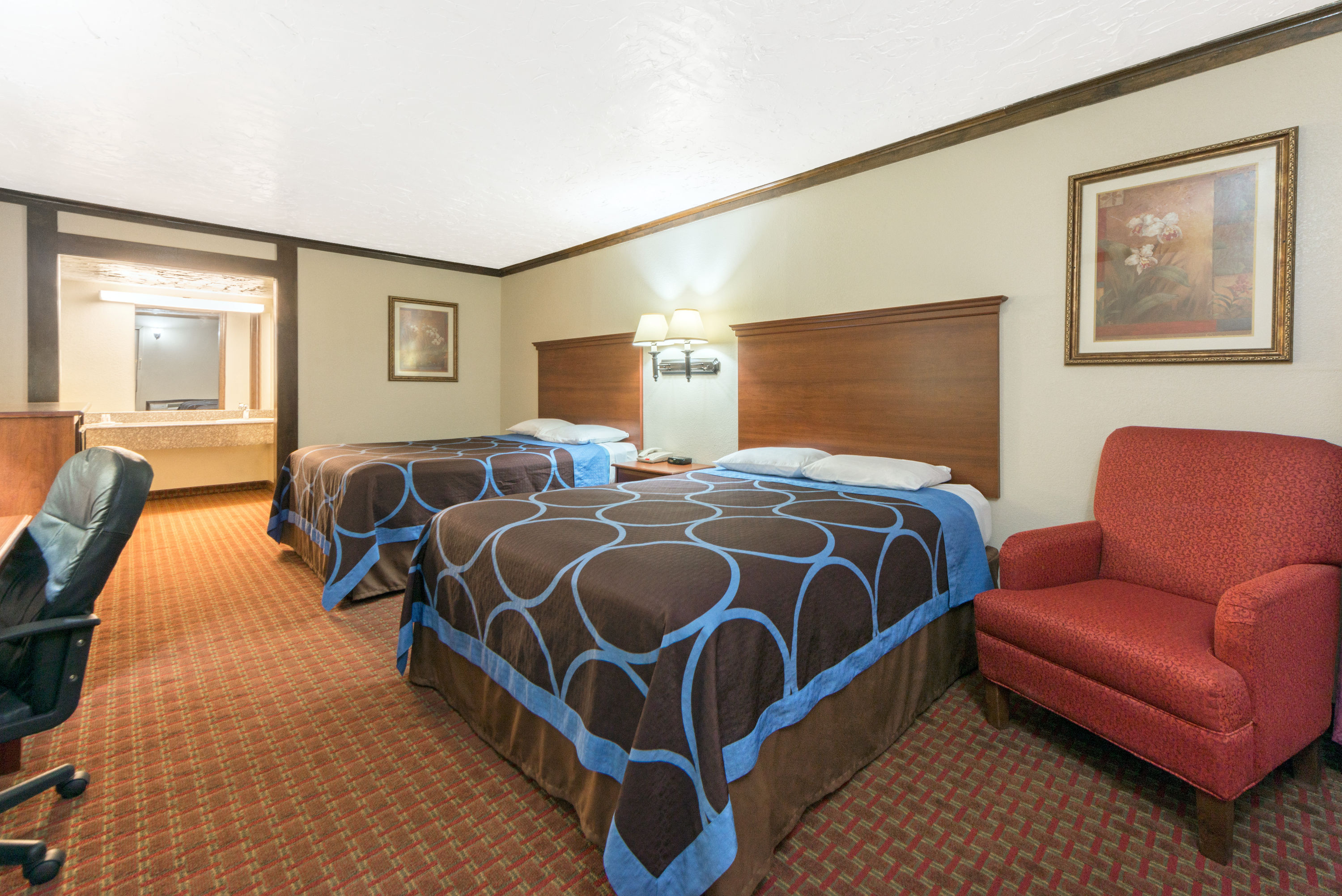Guest room at the Super 8 by Wyndham Enid in Enid, Oklahoma