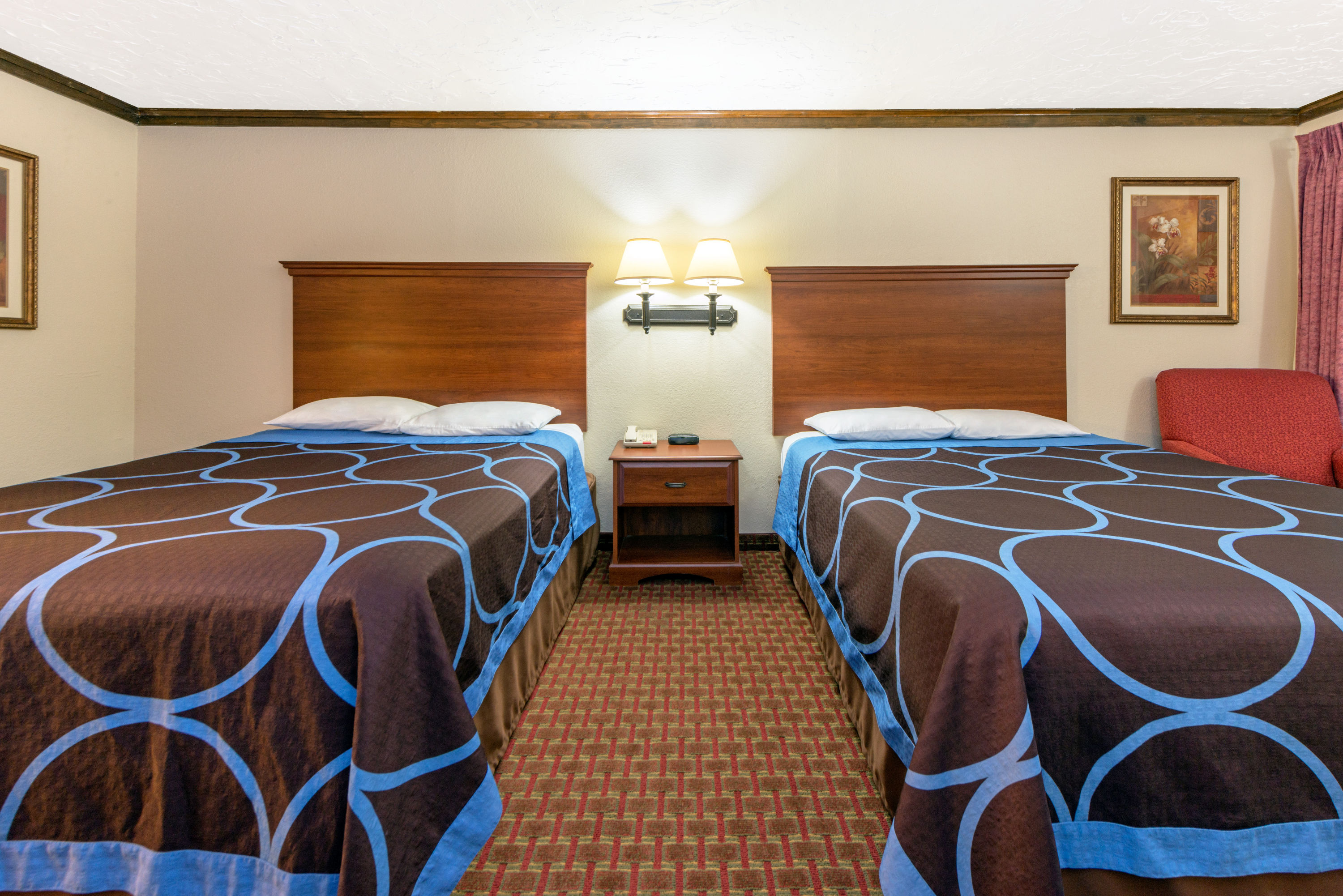 Guest room at the Super 8 by Wyndham Enid in Enid, Oklahoma