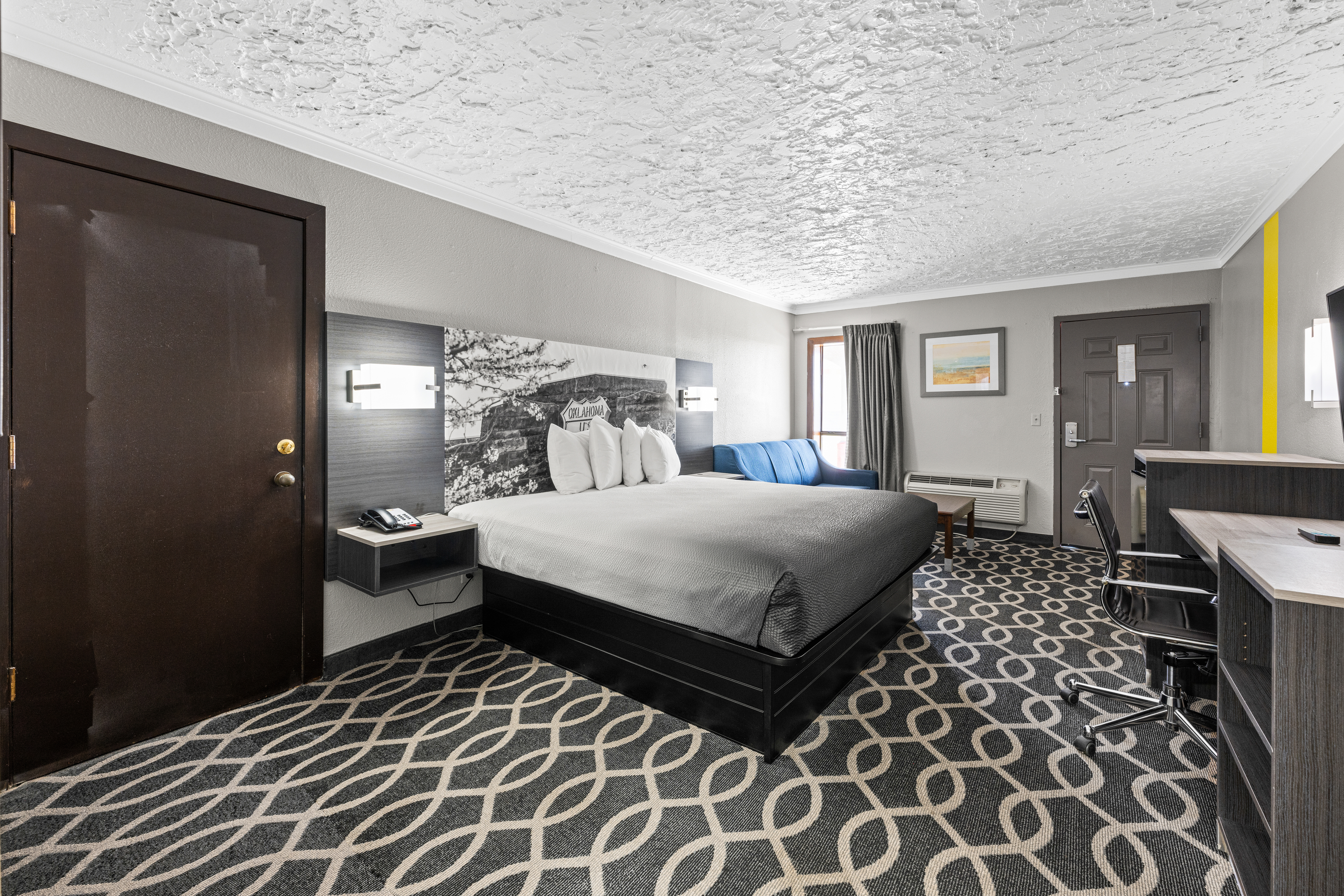 Guest room at the Super 8 by Wyndham Norman West in Norman, Oklahoma