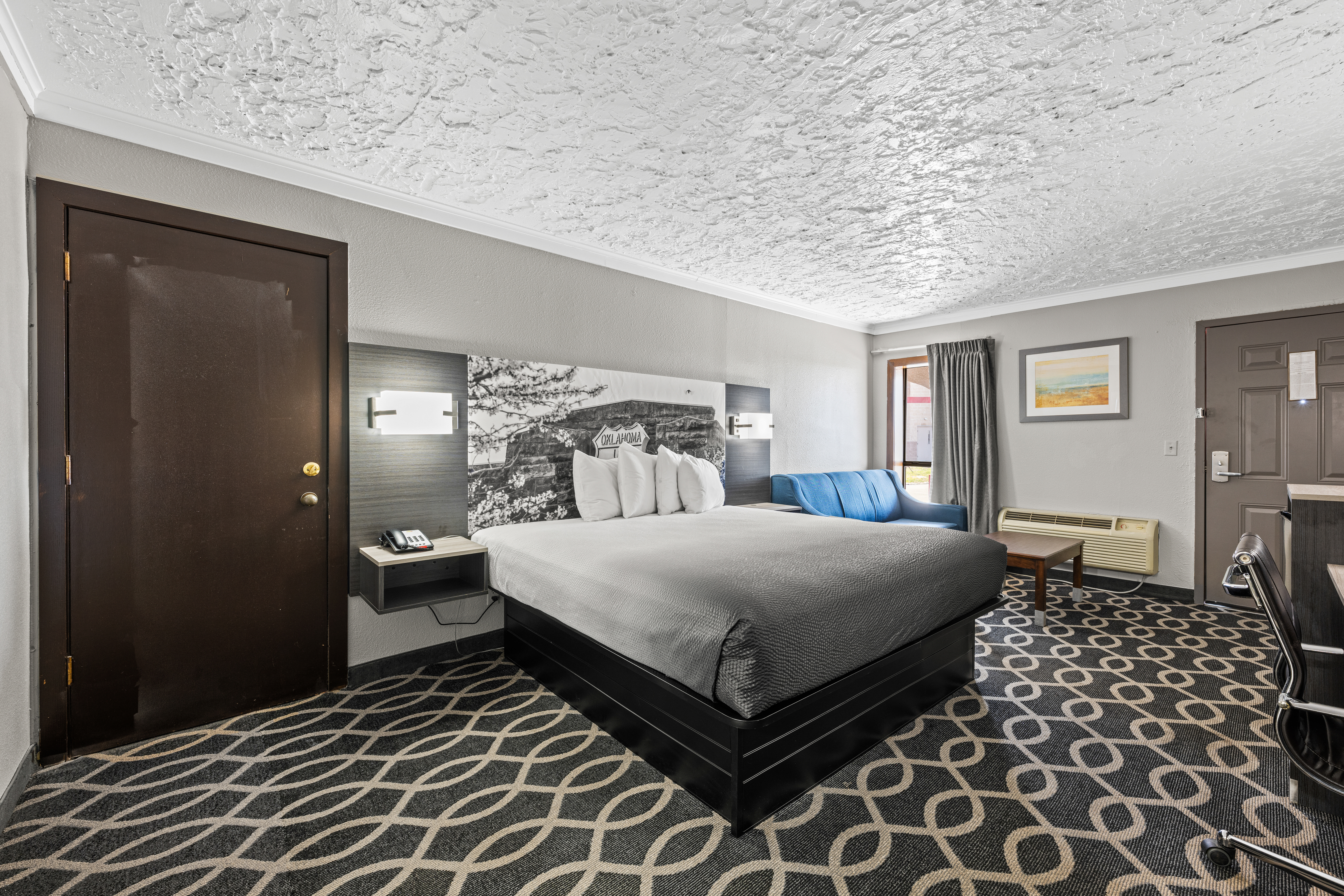Guest room at the Super 8 by Wyndham Norman West in Norman, Oklahoma