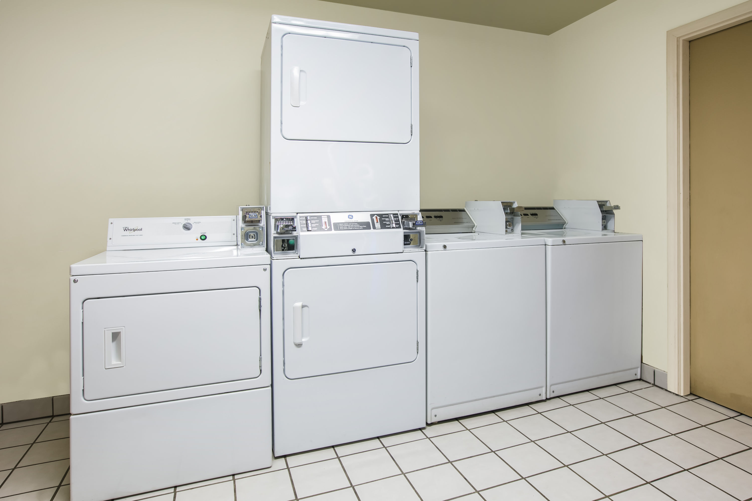 Laundry facilities at Super 8 by Wyndham Oklahoma Airport Fairgrounds West in Oklahoma City, Oklahoma