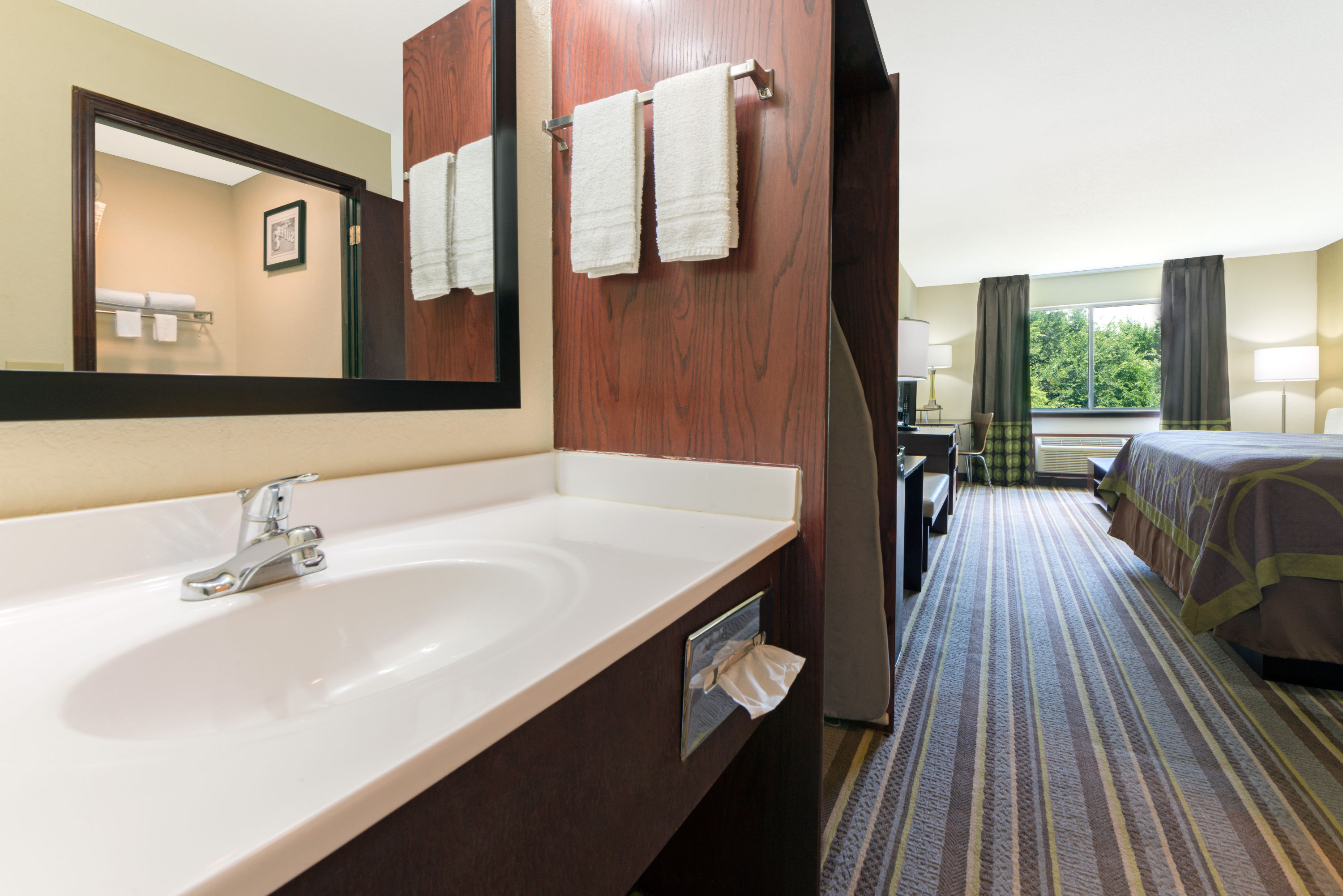 Guest room bath at the Super 8 by Wyndham Perry in Perry, Oklahoma