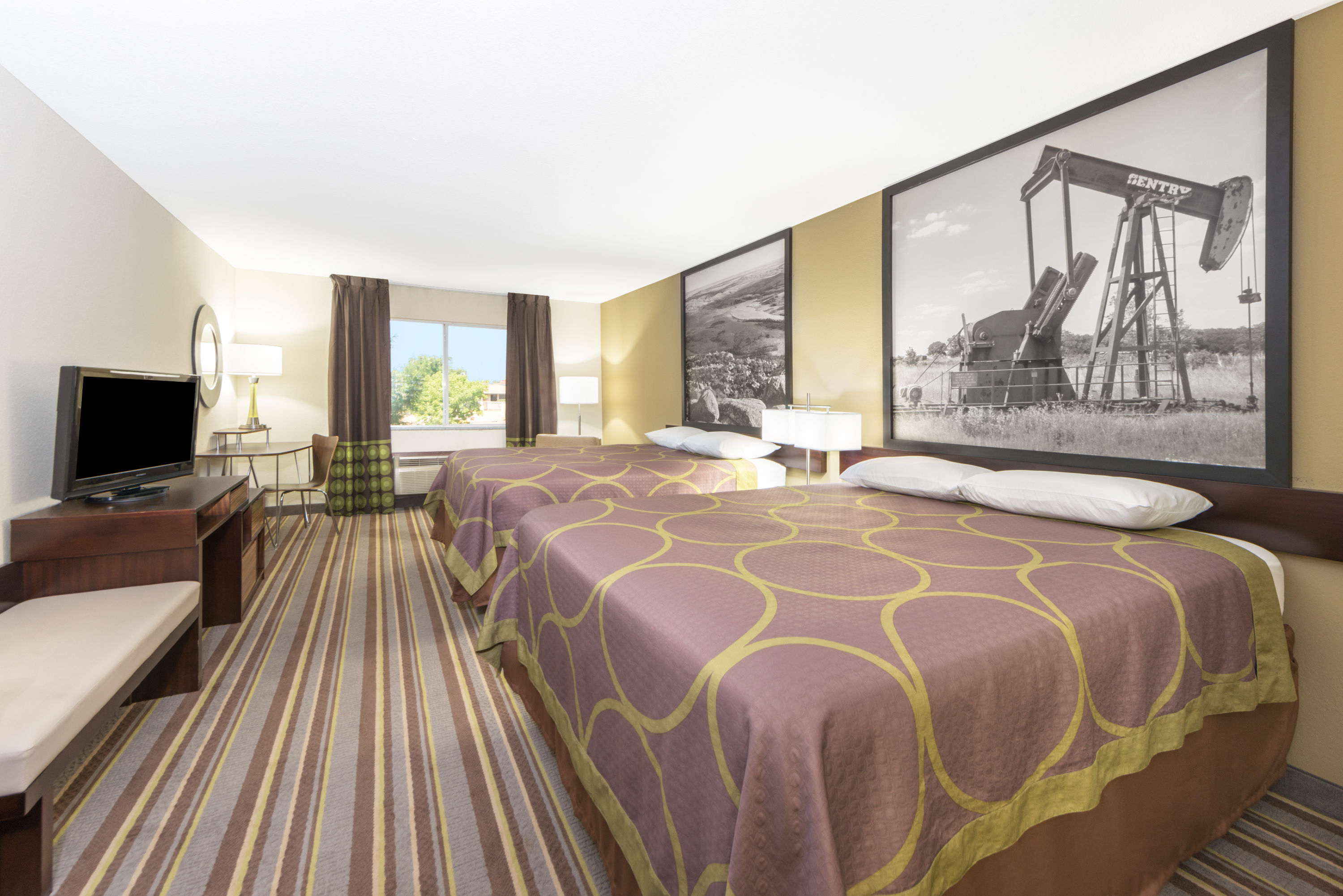 Guest room at the Super 8 by Wyndham Perry in Perry, Oklahoma