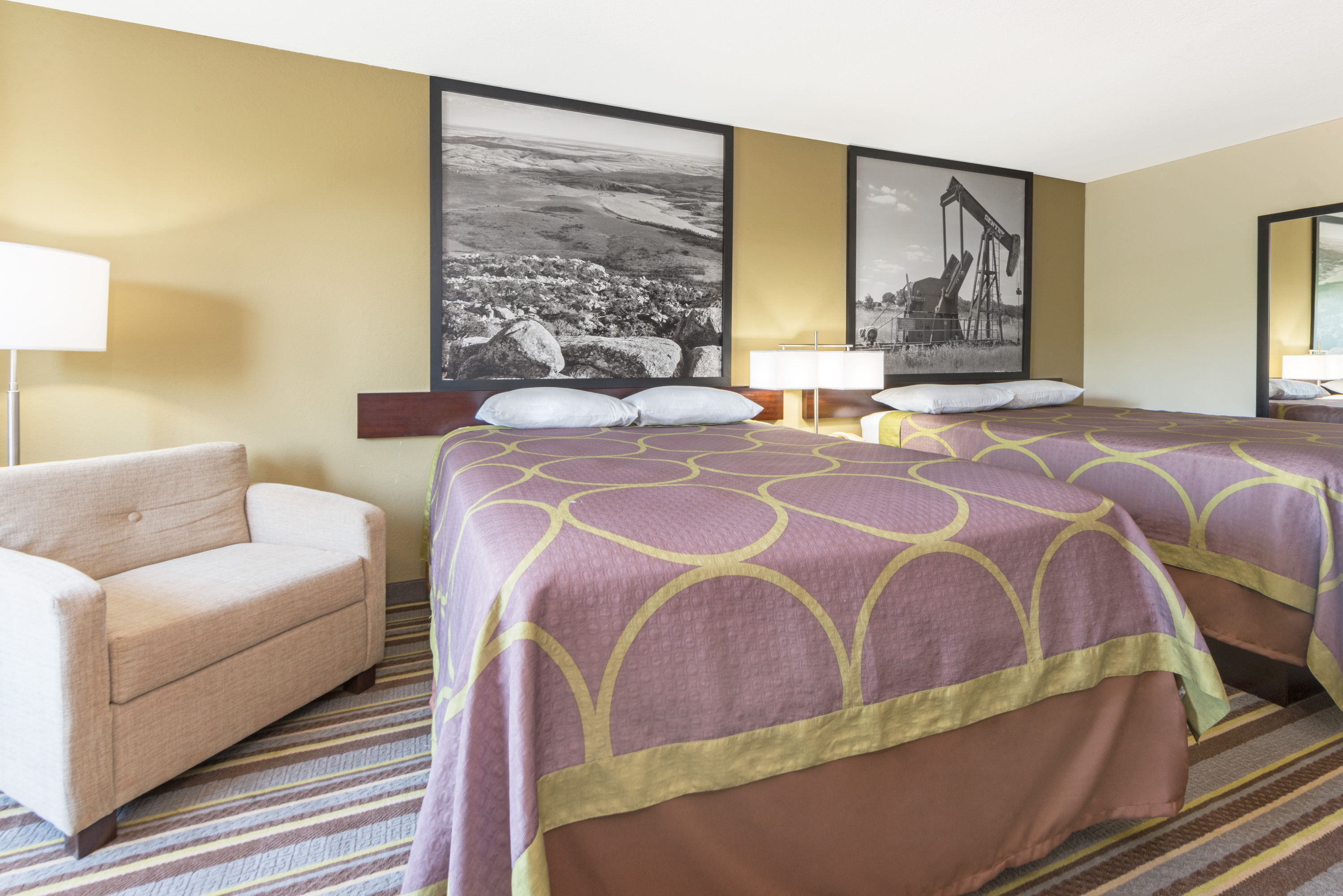 Guest room at the Super 8 by Wyndham Perry in Perry, Oklahoma