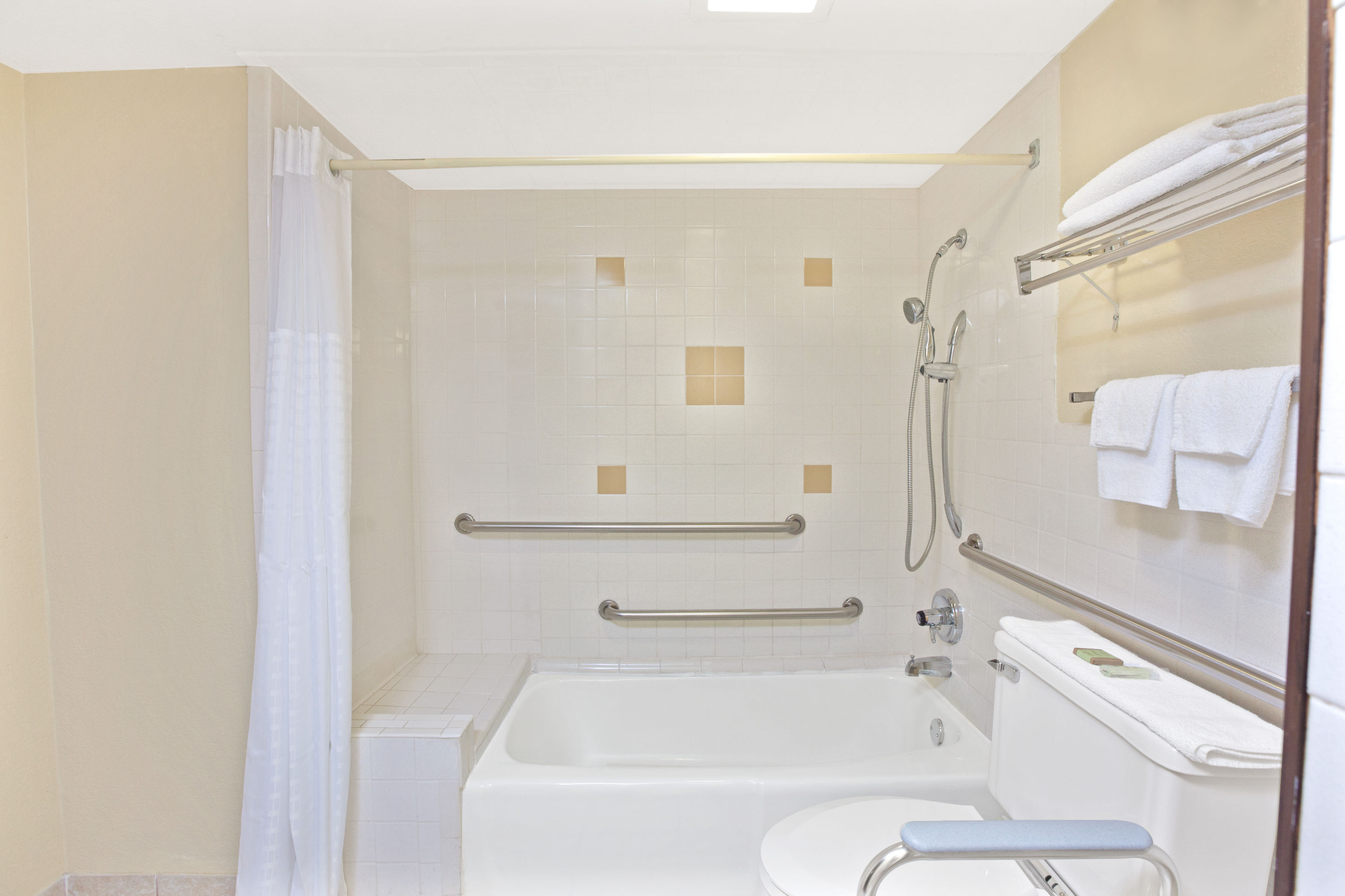 Guest room at the Super 8 by Wyndham Shawnee in Shawnee, Oklahoma