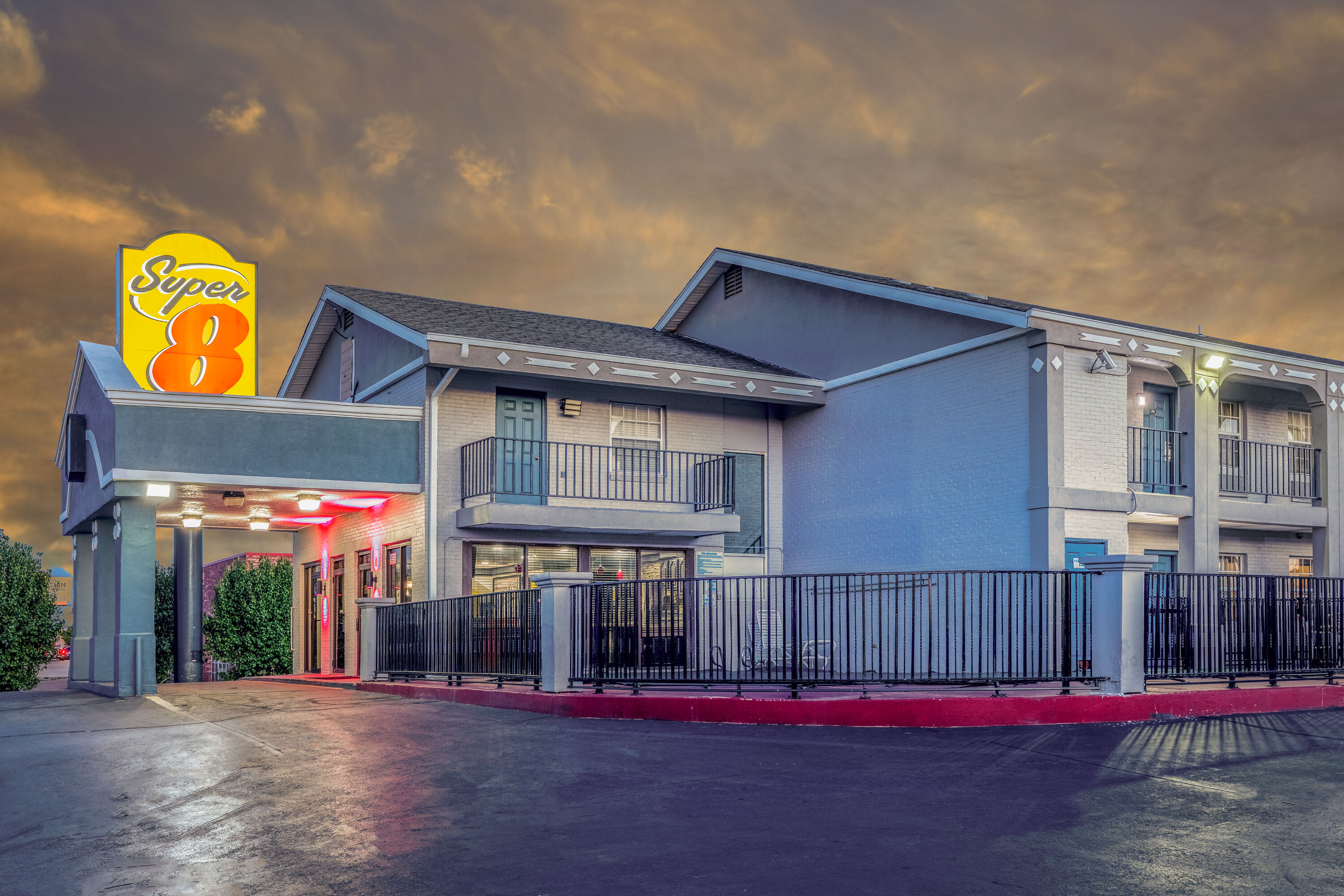 Exterior Dusk Image of Super 8 by Wyndham Tulsa/Arpt/St Fairgrounds hotel in Tulsa, Oklahoma