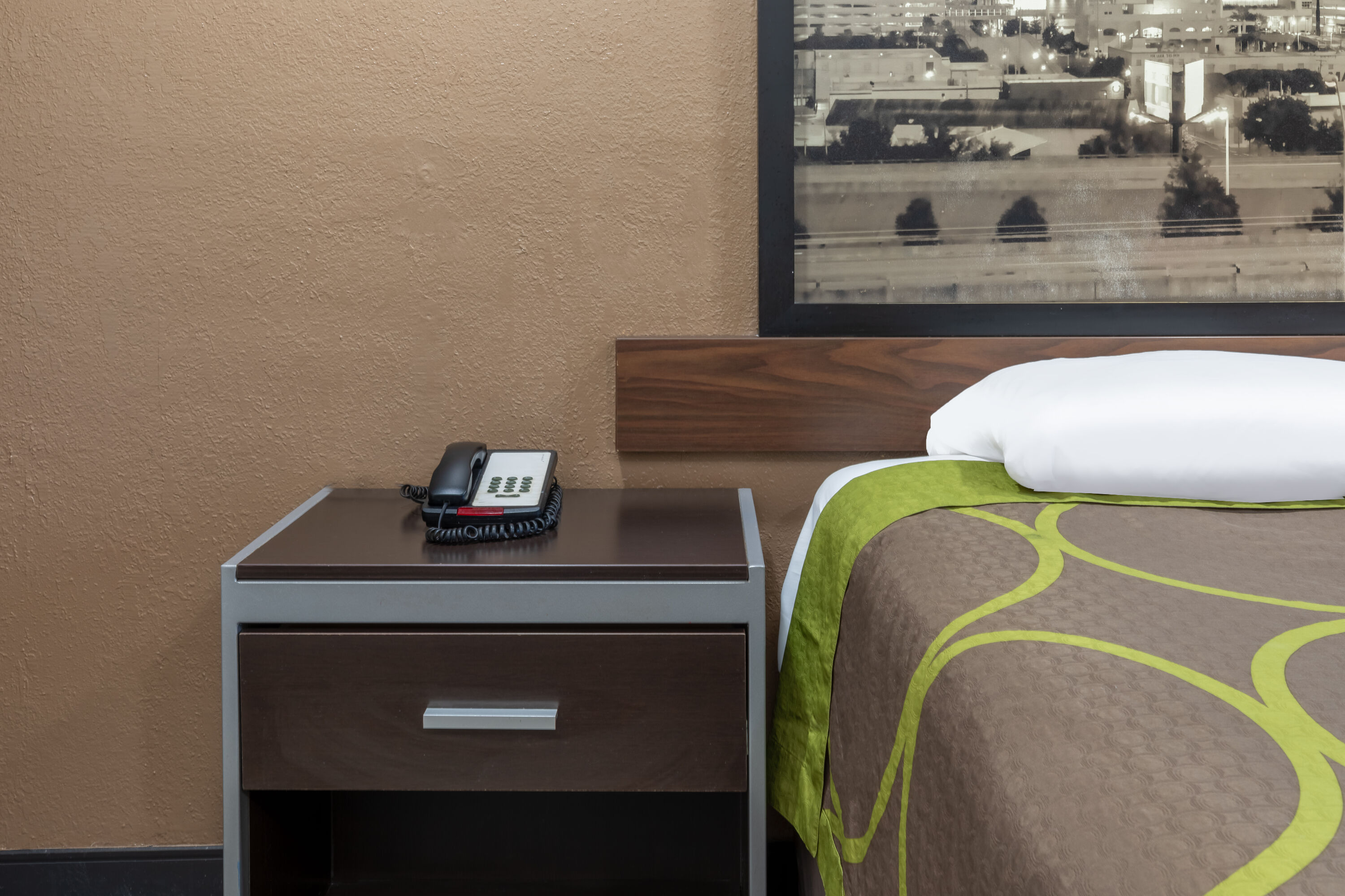 Guest room at the Super 8 by Wyndham Tulsa/Arpt/St Fairgrounds in Tulsa, Oklahoma