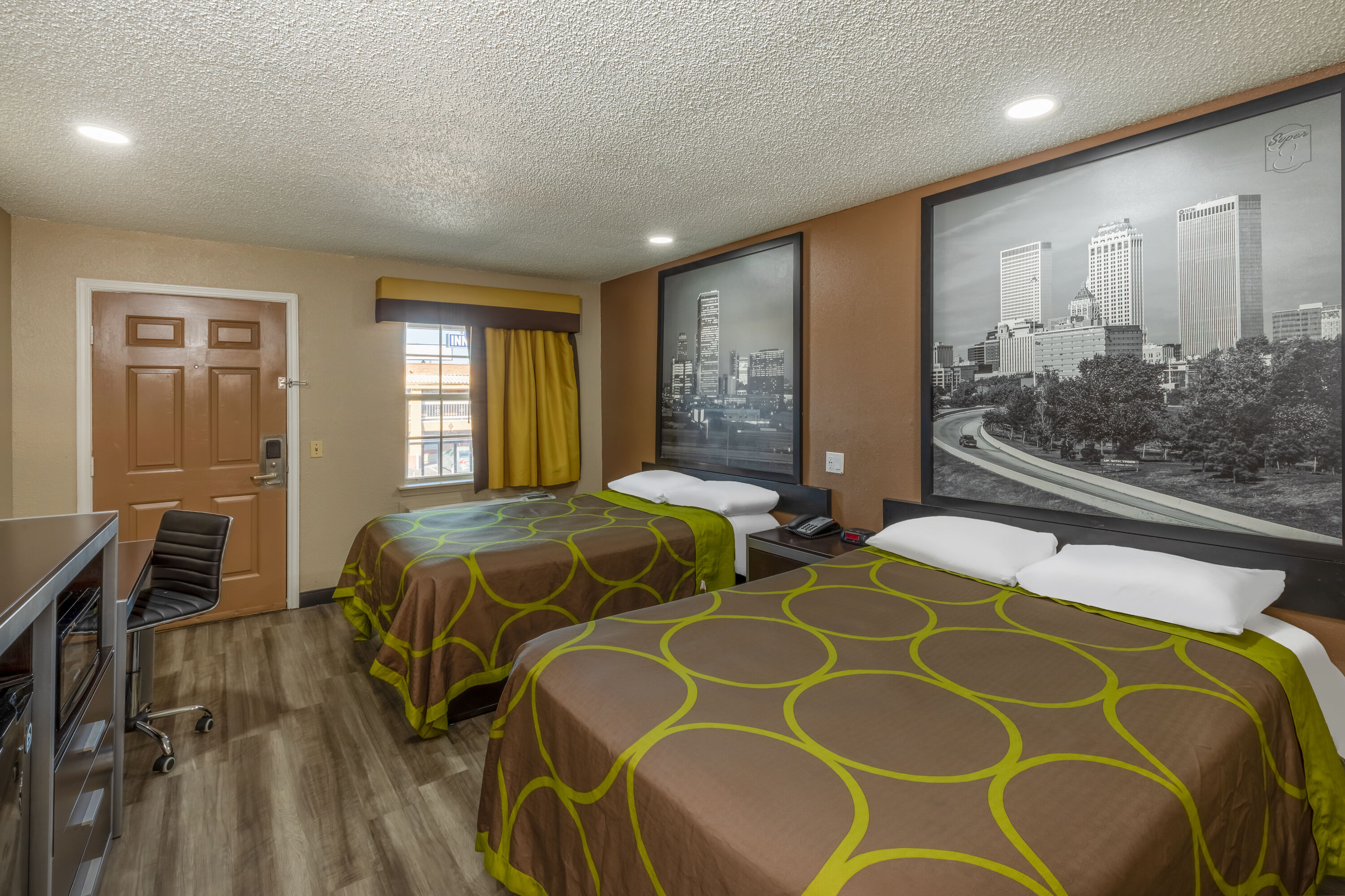 Guest room at the Super 8 by Wyndham Tulsa/Arpt/St Fairgrounds in Tulsa, Oklahoma