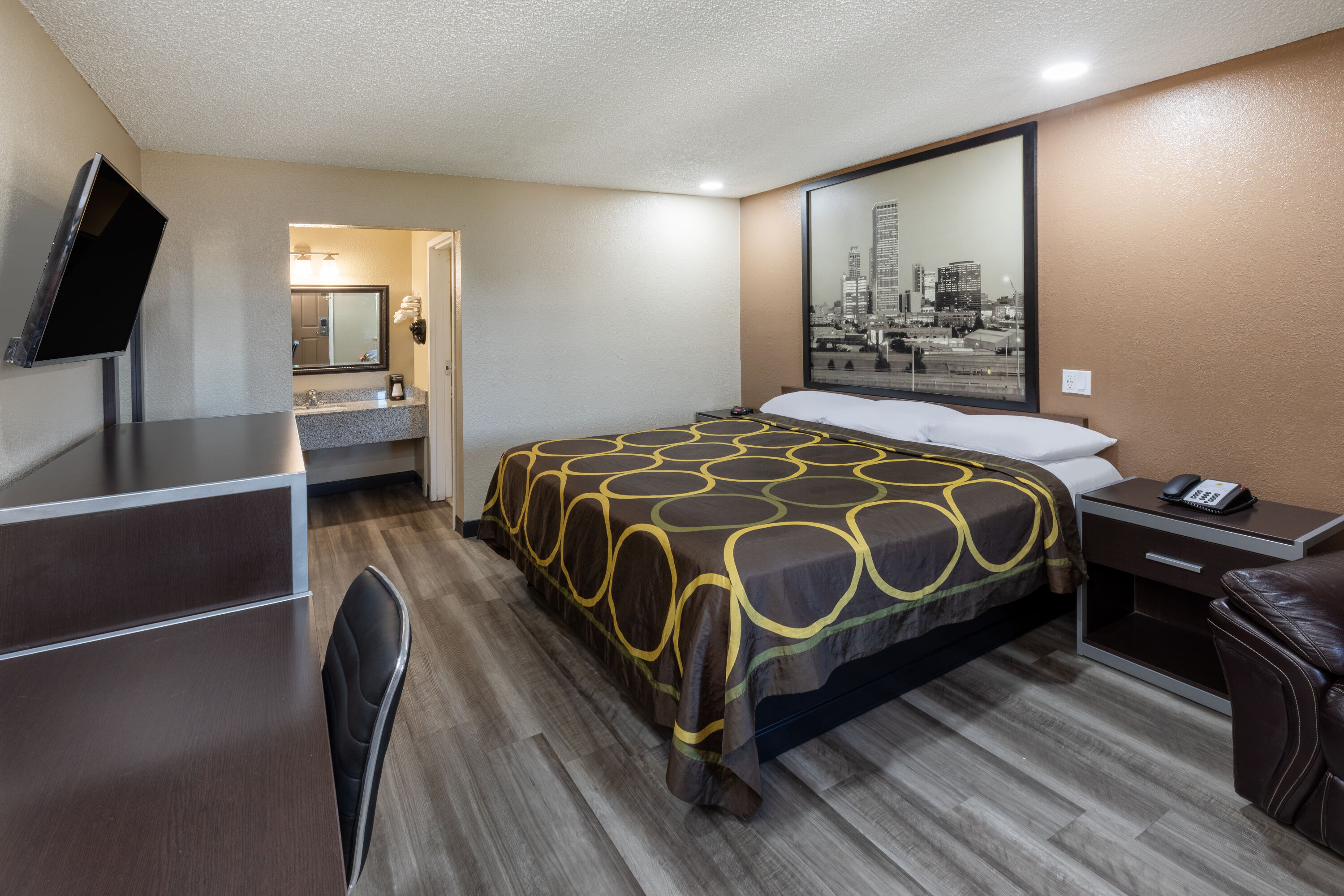 Guest room at the Super 8 by Wyndham Tulsa/Arpt/St Fairgrounds in Tulsa, Oklahoma