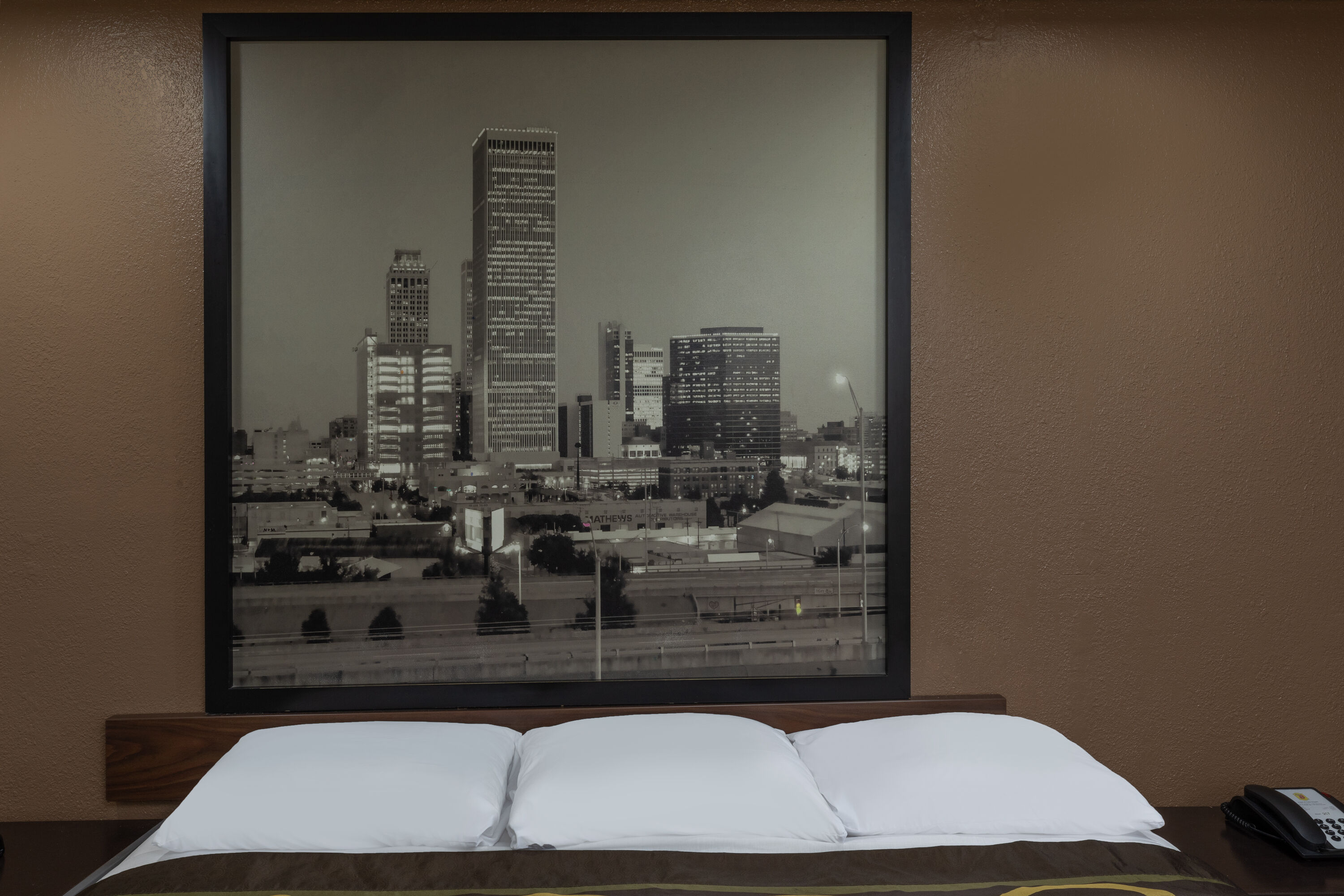 Guest room at the Super 8 by Wyndham Tulsa/Arpt/St Fairgrounds in Tulsa, Oklahoma