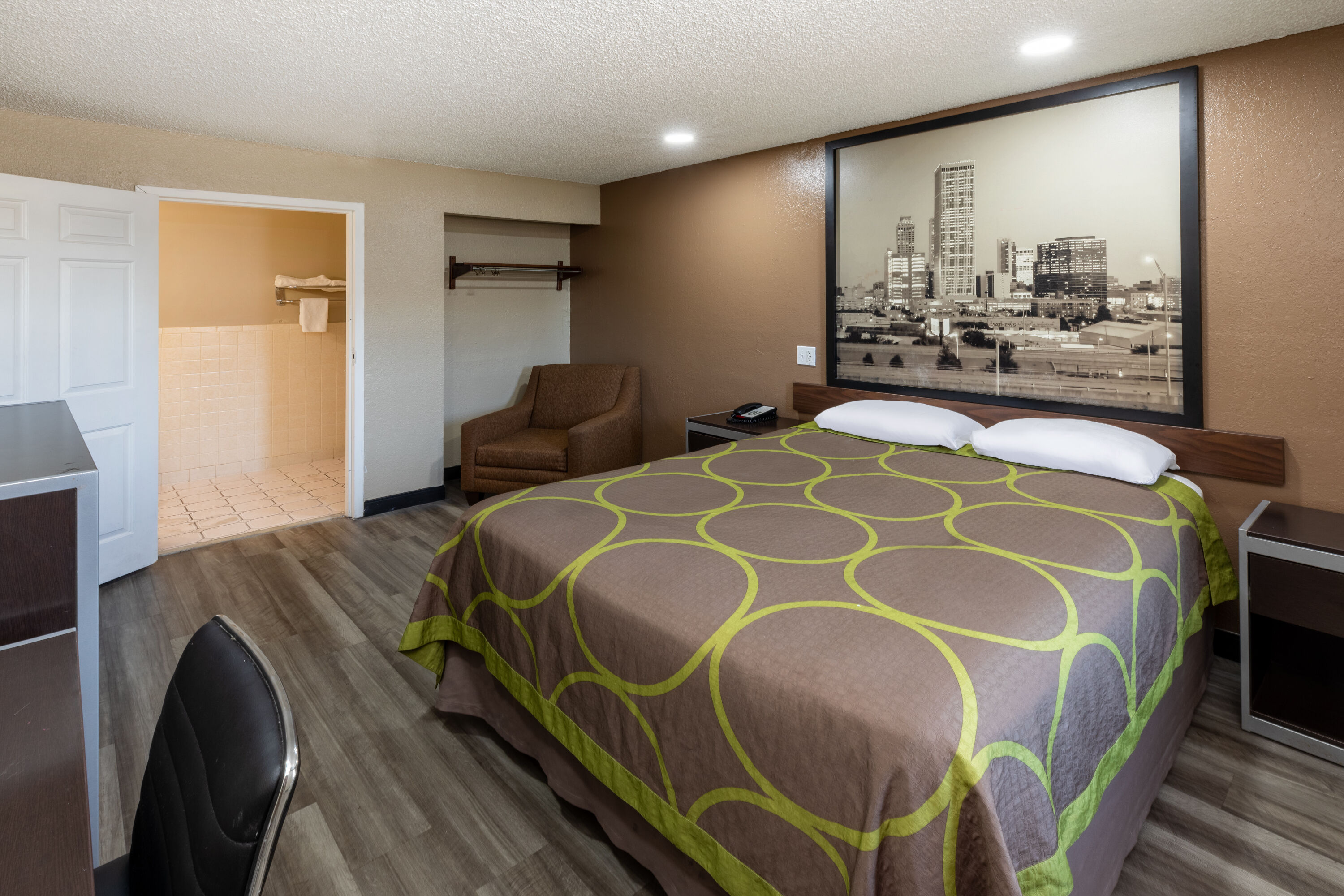 Guest room at the Super 8 by Wyndham Tulsa/Arpt/St Fairgrounds in Tulsa, Oklahoma