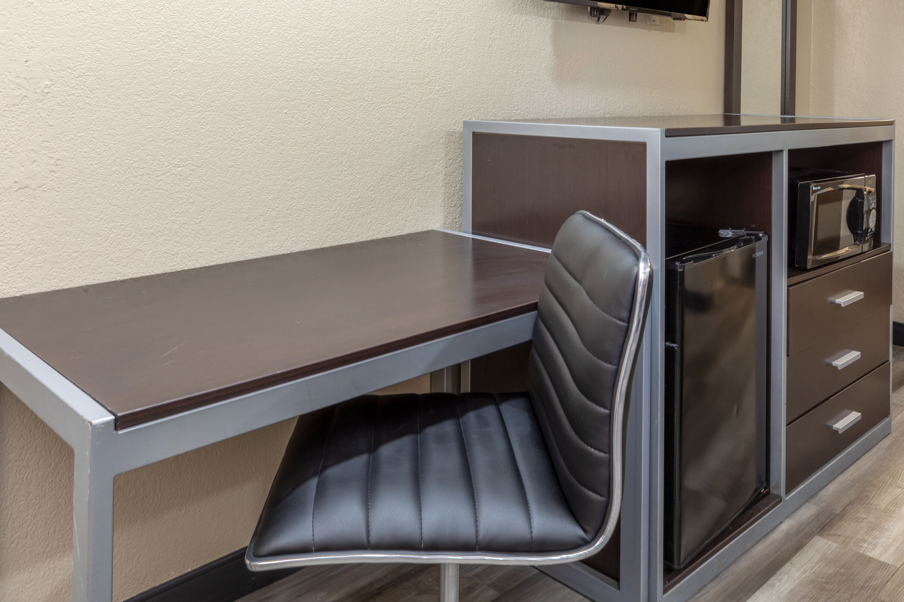 Guest room at the Super 8 by Wyndham Tulsa/Arpt/St Fairgrounds in Tulsa, Oklahoma