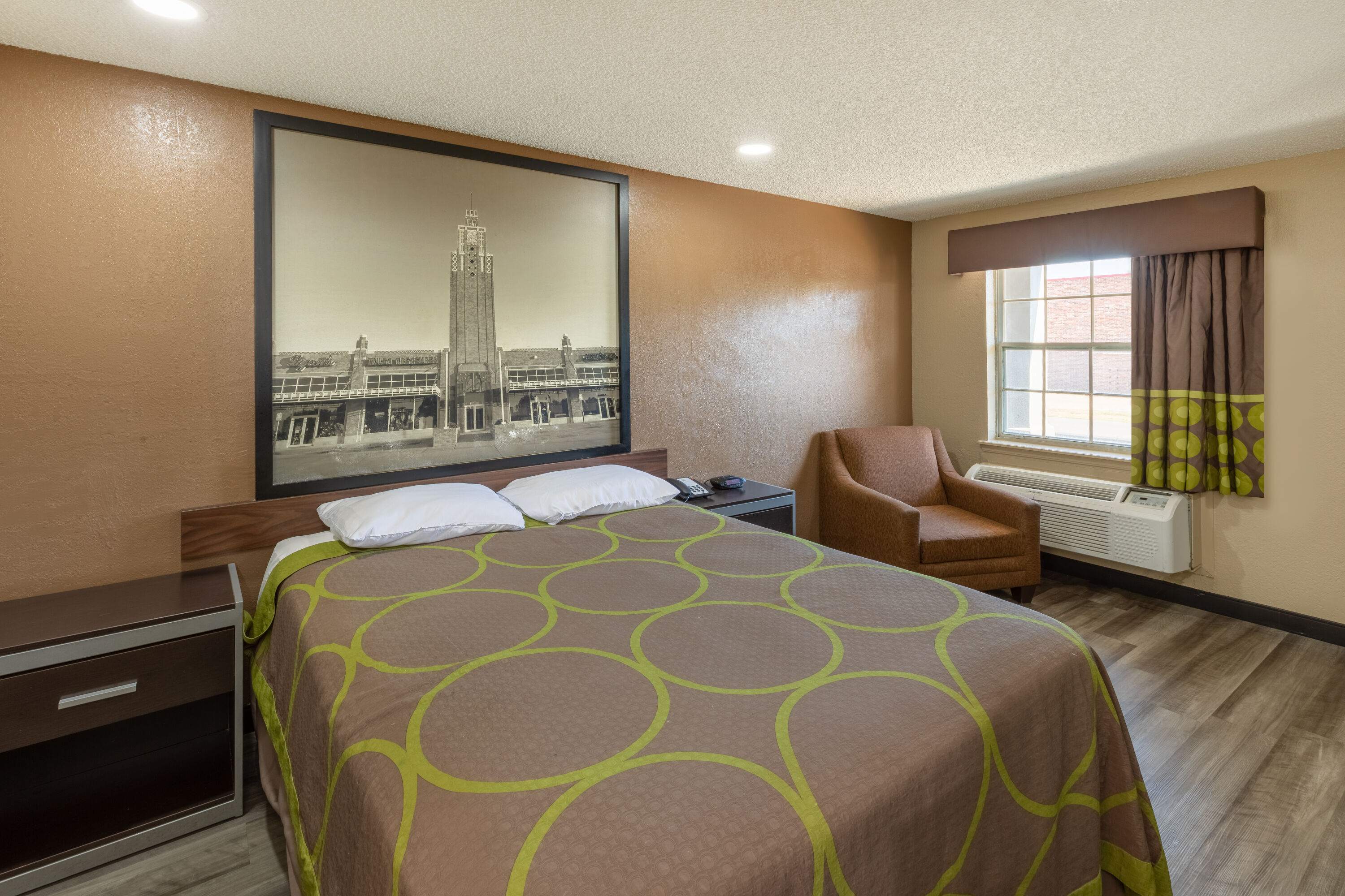 Guest room at the Super 8 by Wyndham Tulsa/Arpt/St Fairgrounds in Tulsa, Oklahoma
