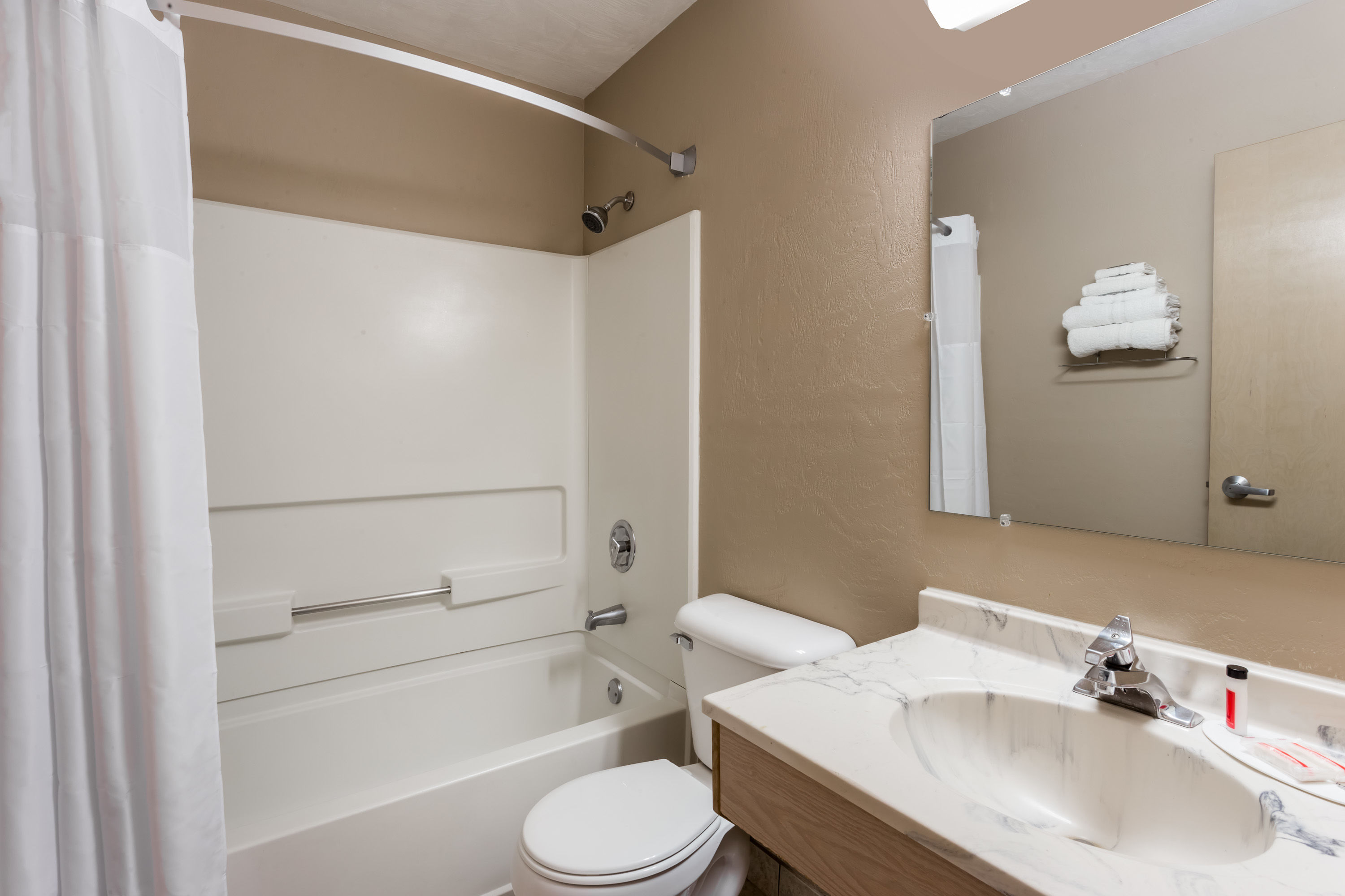 Guest room bath at the Super 8 by Wyndham Corvallis in Corvallis, Oregon