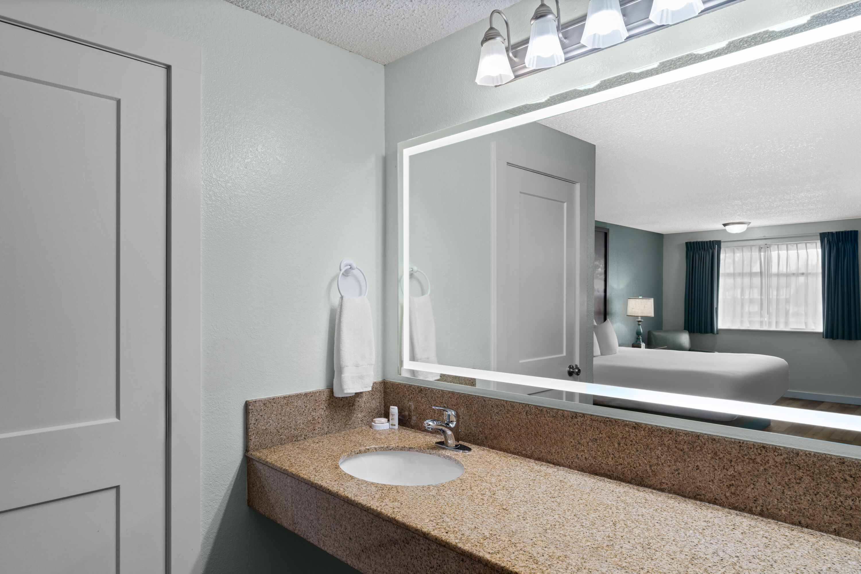 Guest room bath at the Super 8 by Wyndham Florence OR in Florence, Oregon