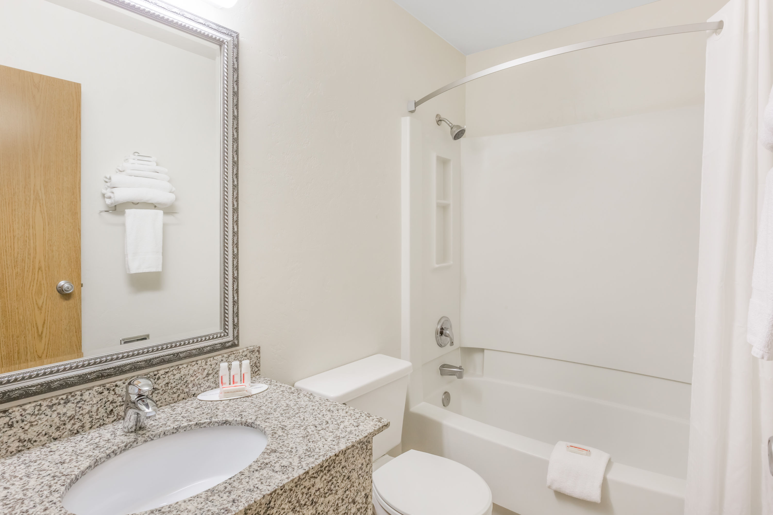 Guest room bath at the Super 8 by Wyndham Grants Pass in Grants Pass, Oregon