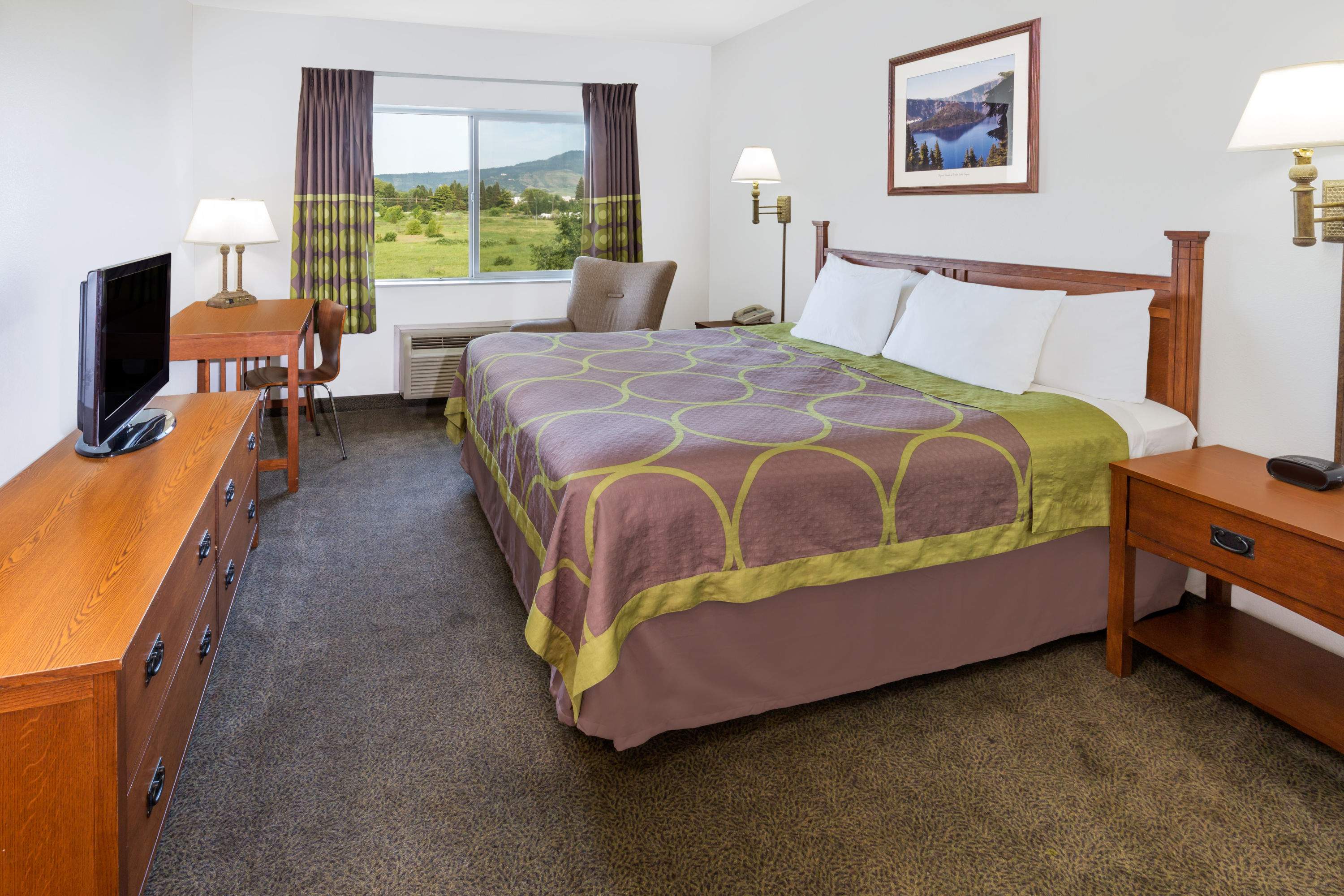 Guest room at the Super 8 by Wyndham Central Pt Medford in Medford, Oregon