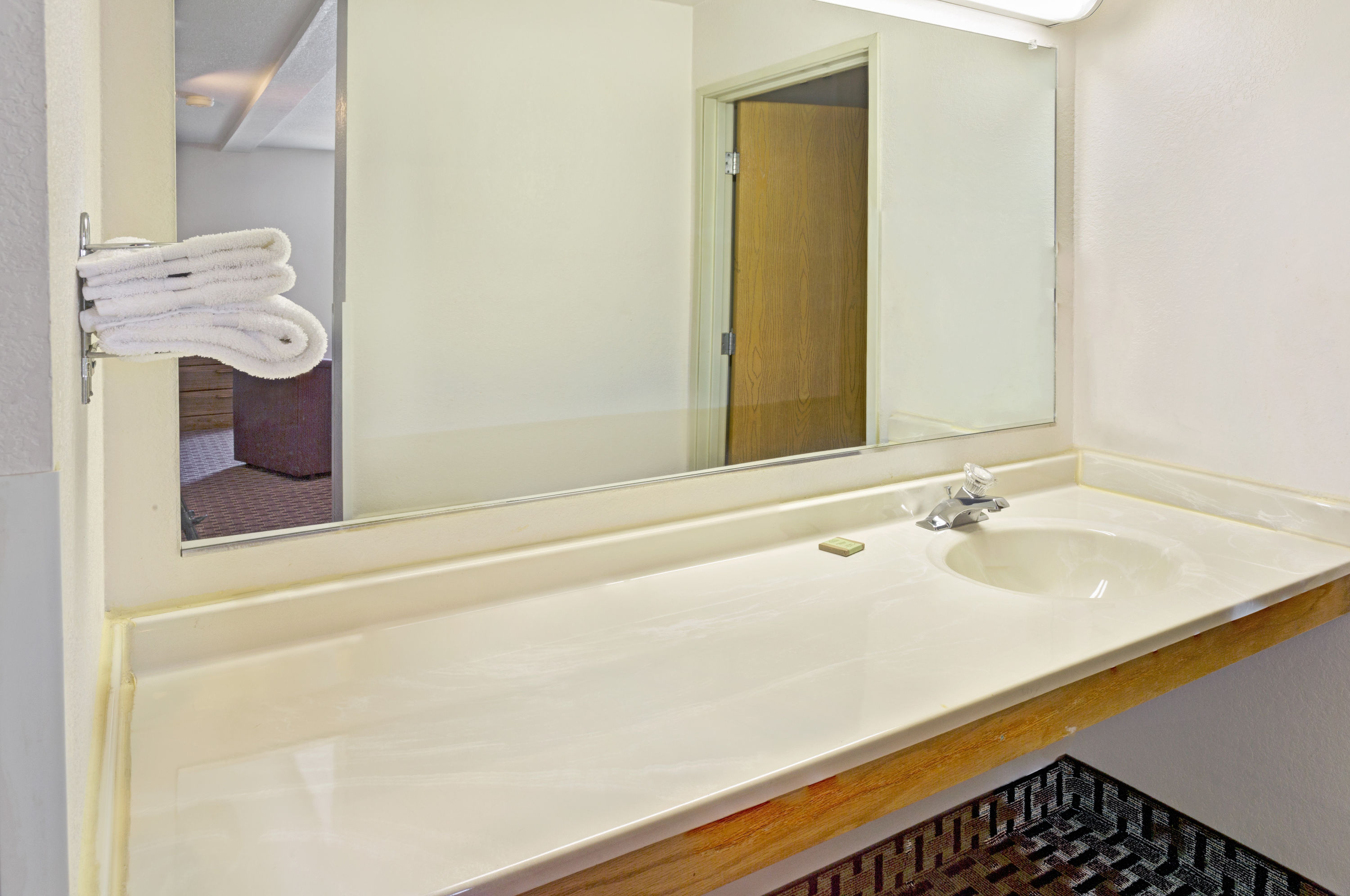 Guest room at the Super 8 by Wyndham Canonsburg/Pittsburgh Area in Canonsburg, Pennsylvania