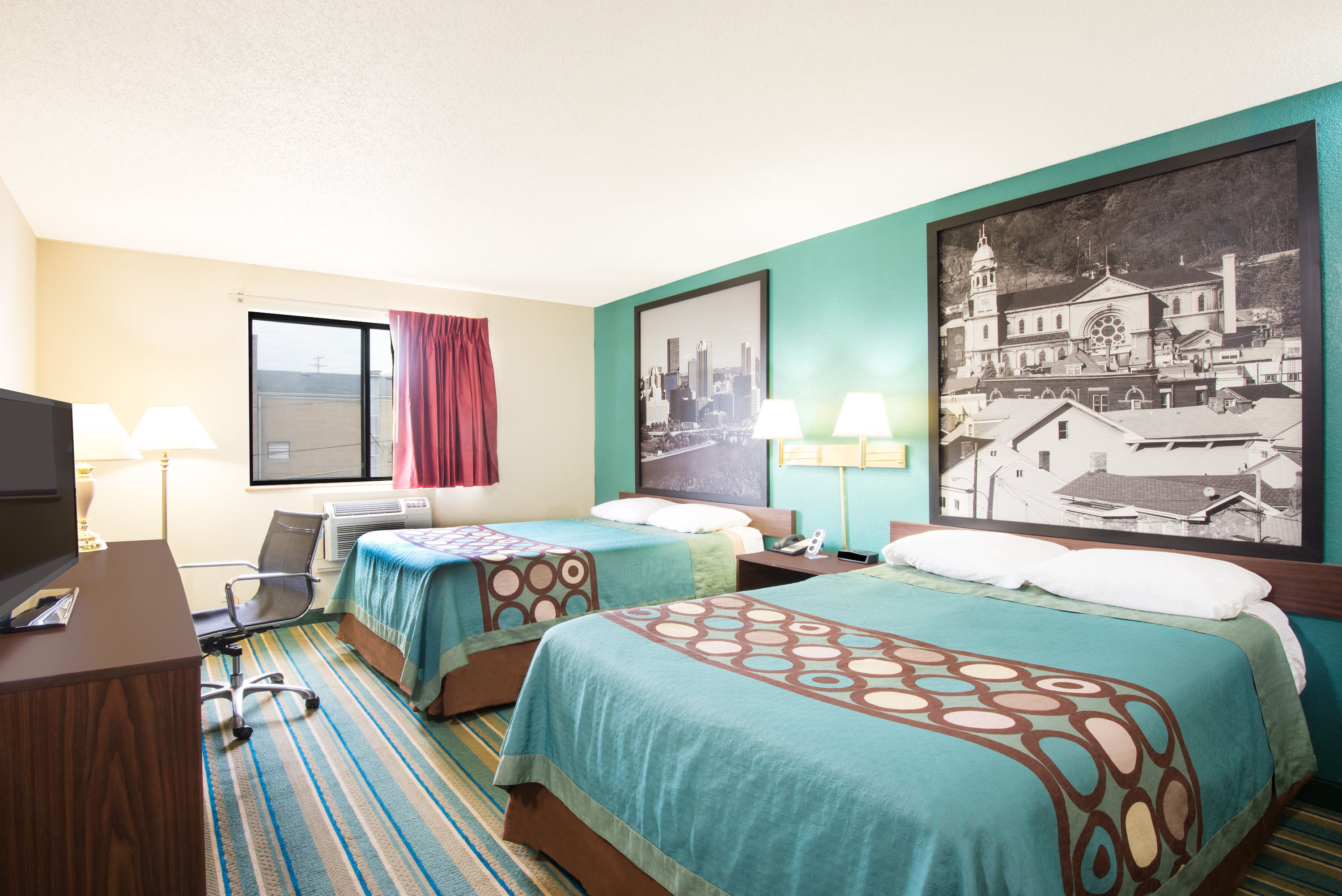 Guest room at the Super 8 by Wyndham Pittsburgh PA Airport/University Area in Coraopolis, Pennsylvania