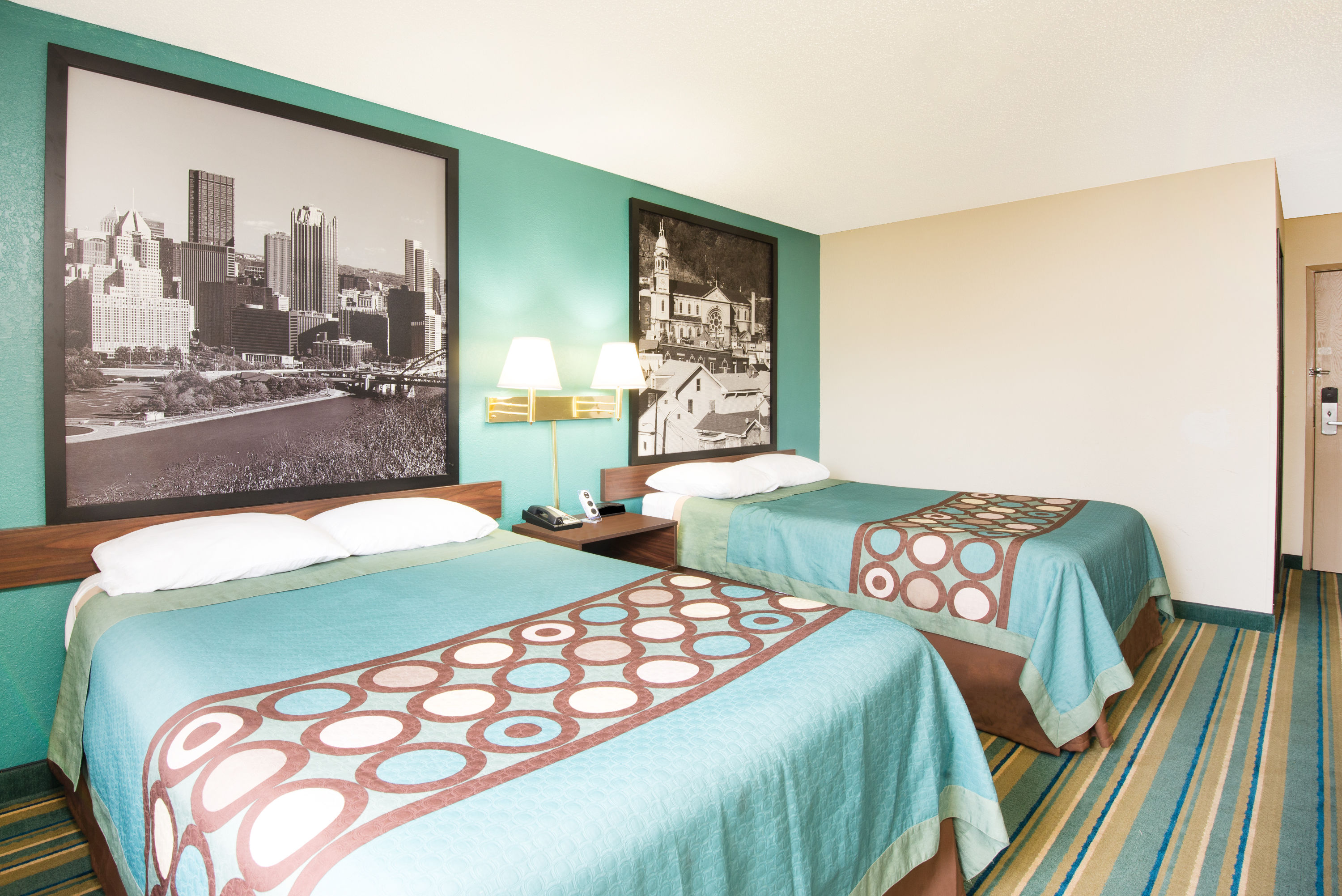 Guest room at the Super 8 by Wyndham Pittsburgh PA Airport/University Area in Coraopolis, Pennsylvania