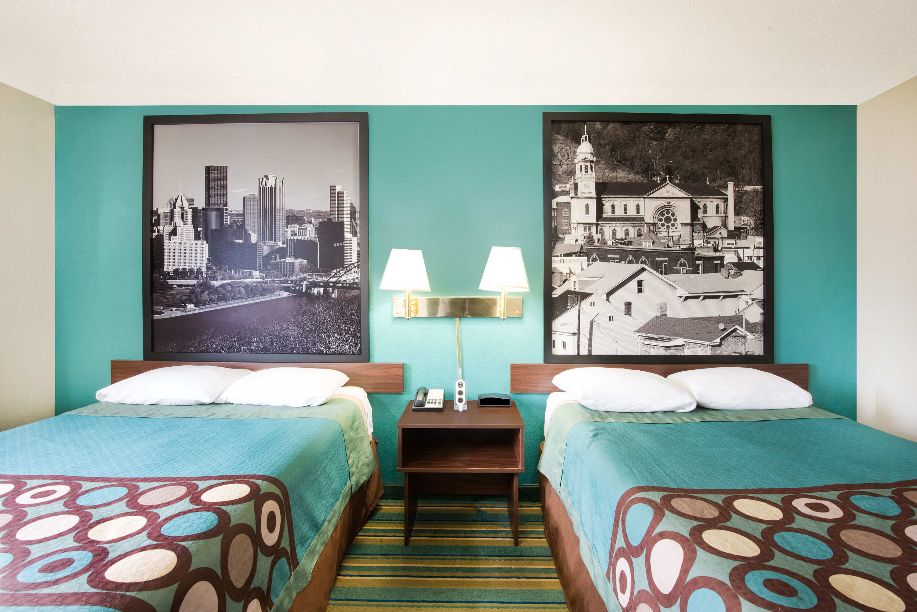 Guest room at the Super 8 by Wyndham Pittsburgh PA Airport/University Area in Coraopolis, Pennsylvania