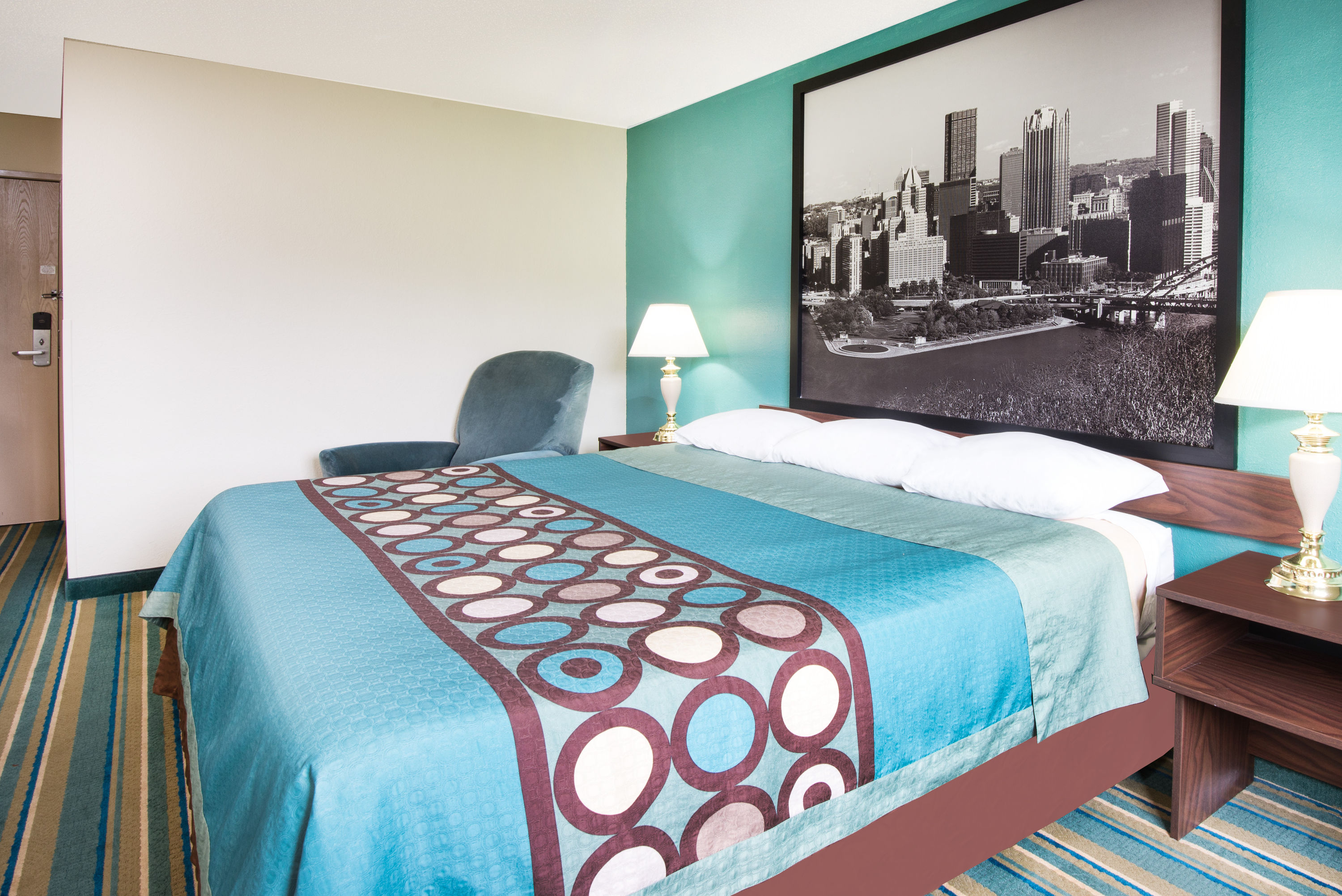 Guest room at the Super 8 by Wyndham Pittsburgh PA Airport/University Area in Coraopolis, Pennsylvania