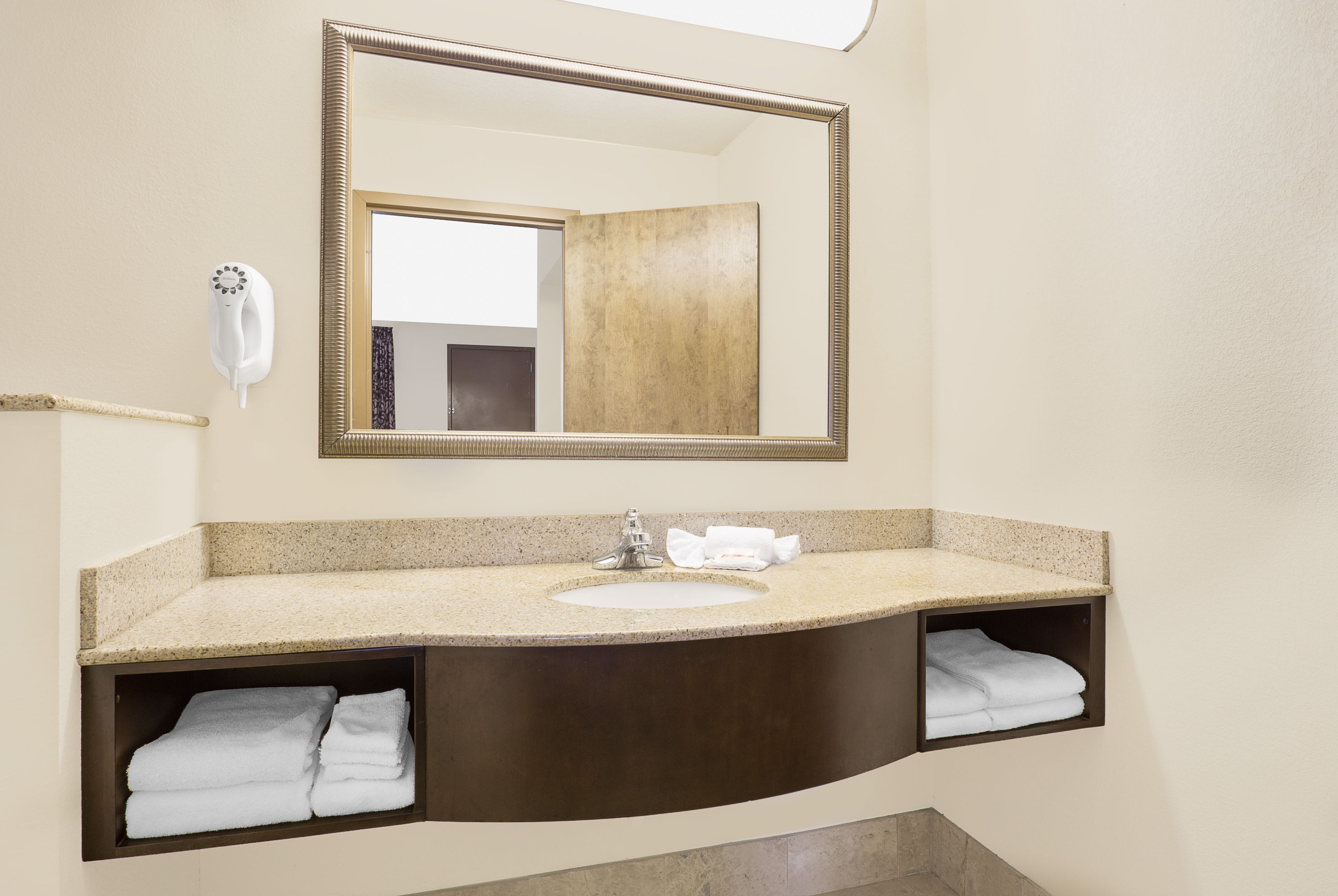 Guest room bath at the Super 8 by Wyndham Danville in Danville, Pennsylvania