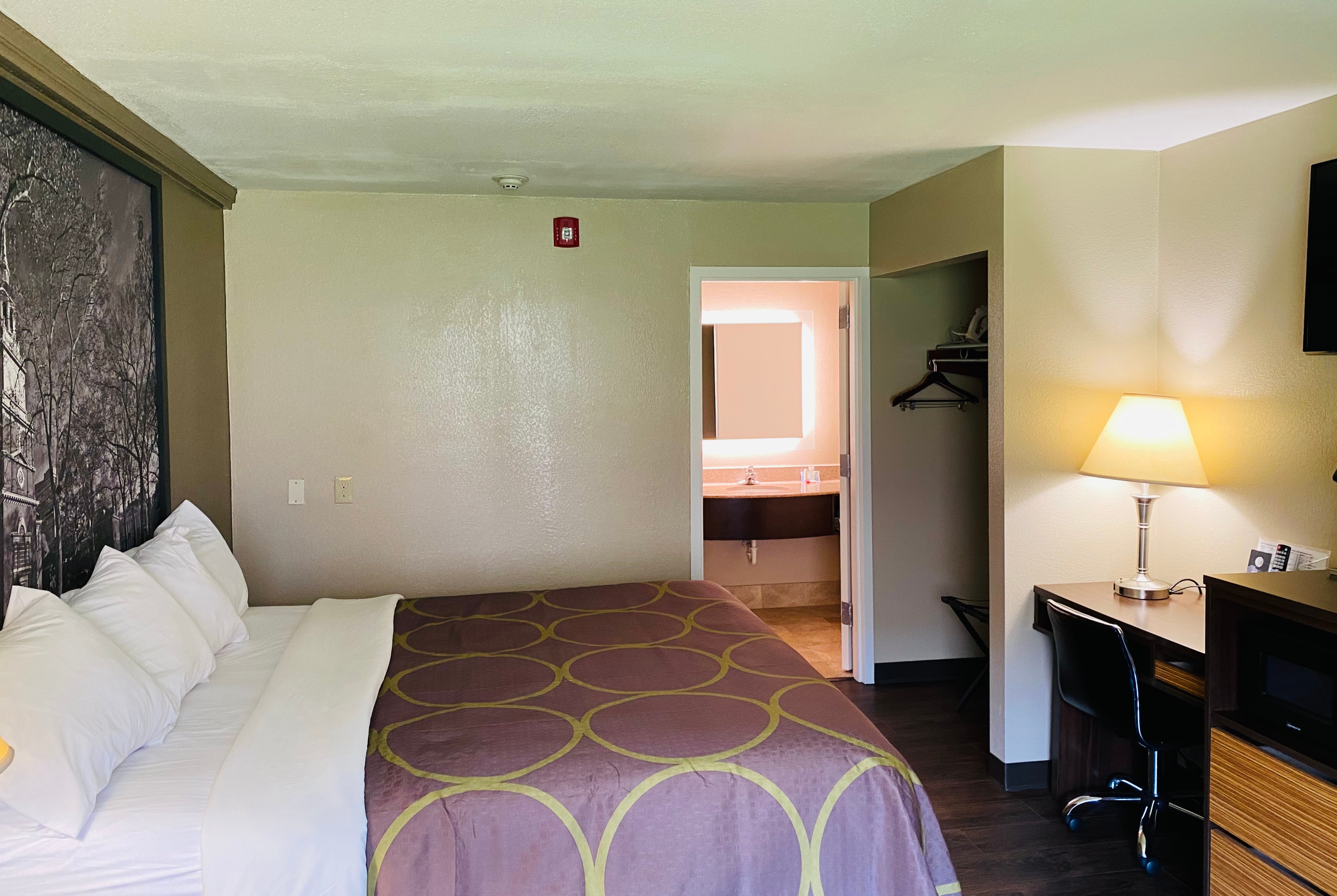 King bed guest room at the Super 8 by Wyndham Danville in Danville, Pennsylvania