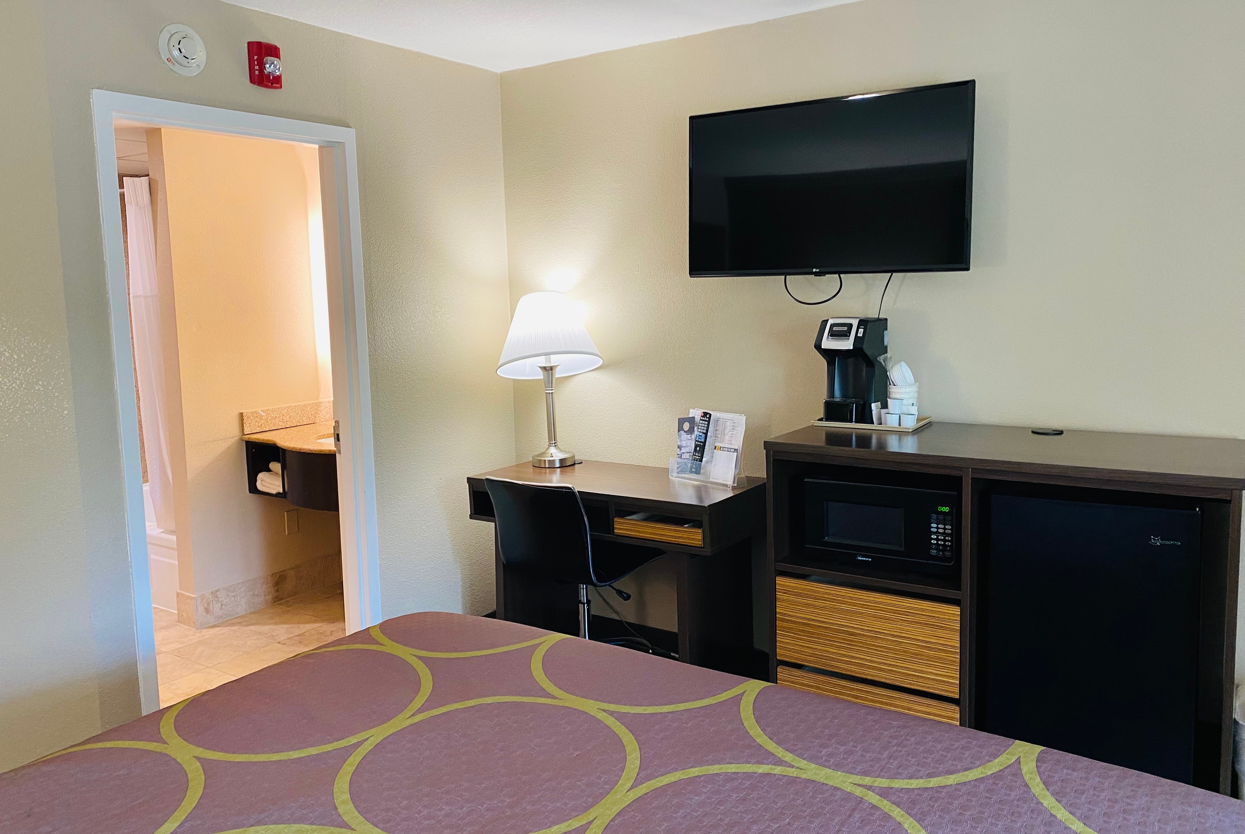 King bed guest room at the Super 8 by Wyndham Danville in Danville, Pennsylvania