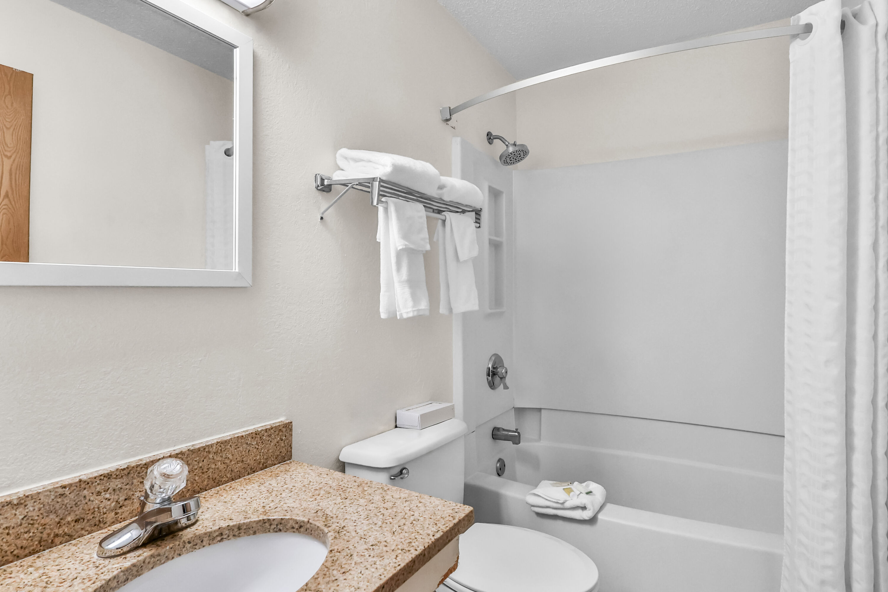 Guest room bath at the Super 8 by Wyndham East Stroudsburg/Poconos in East Stroudsburg, Pennsylvania