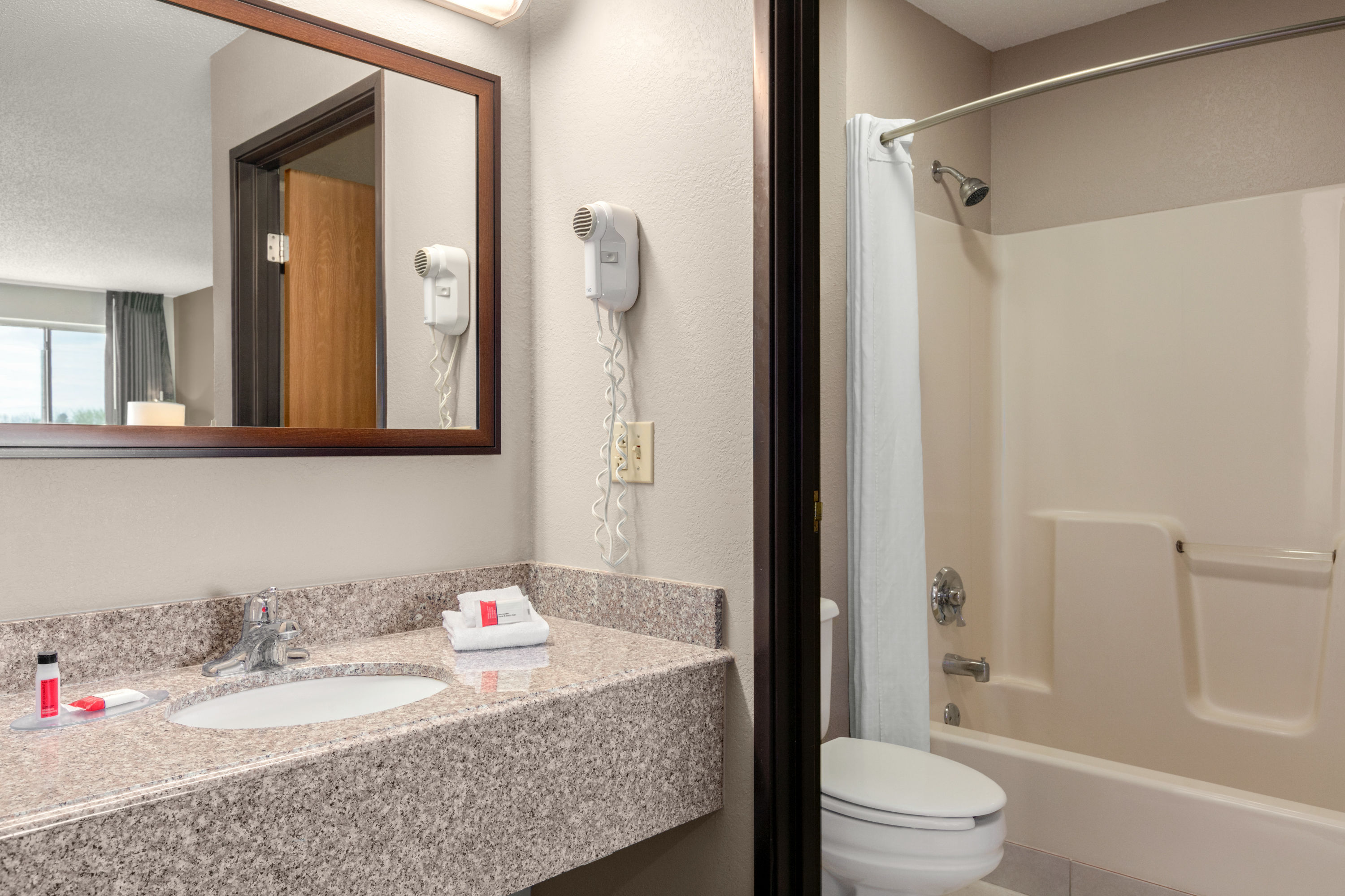 Guest room bath at the Super 8 by Wyndham Hanover in Hanover, Pennsylvania