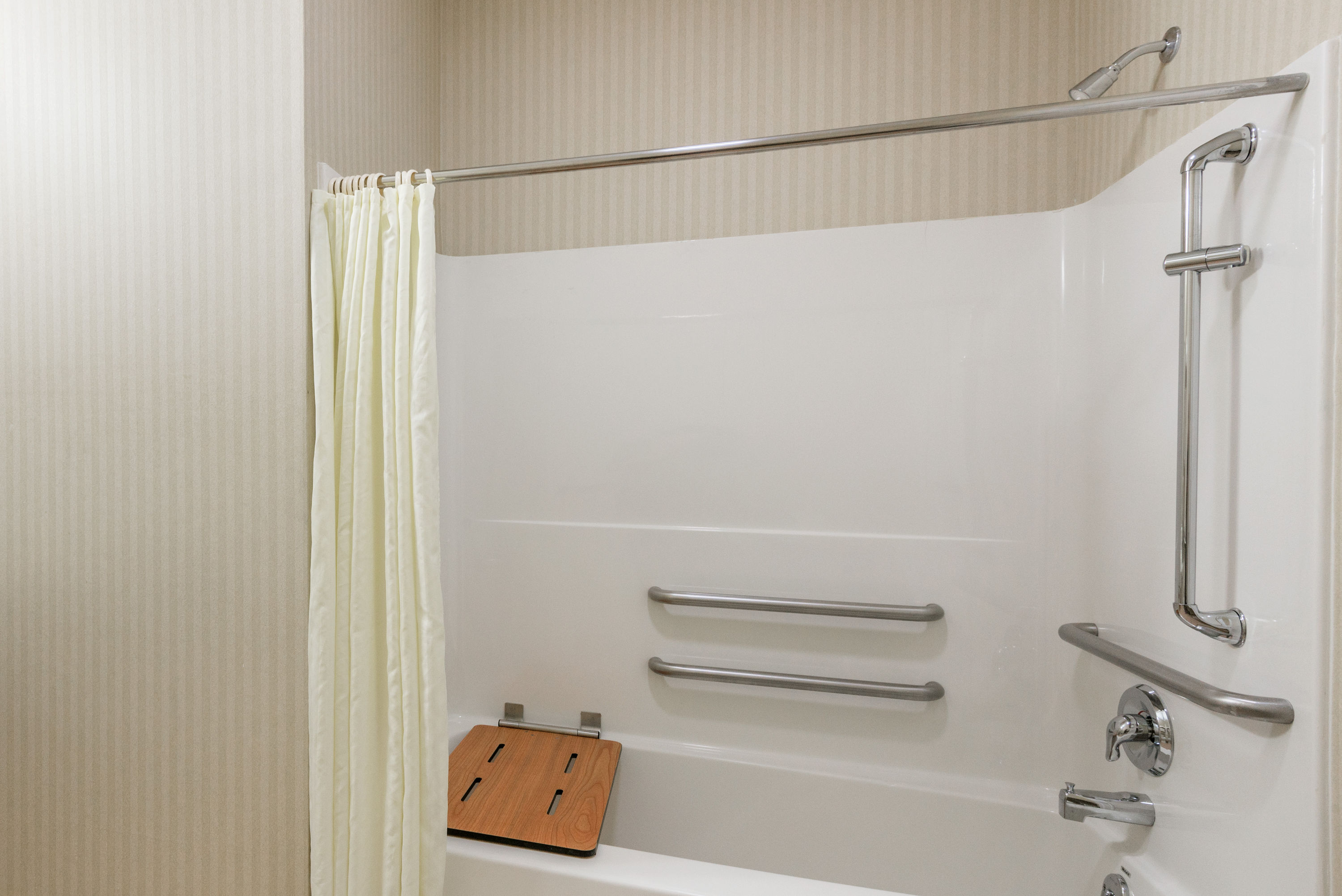 Guest room at the Super 8 by Wyndham Harrisburg Hershey North in Harrisburg, Pennsylvania