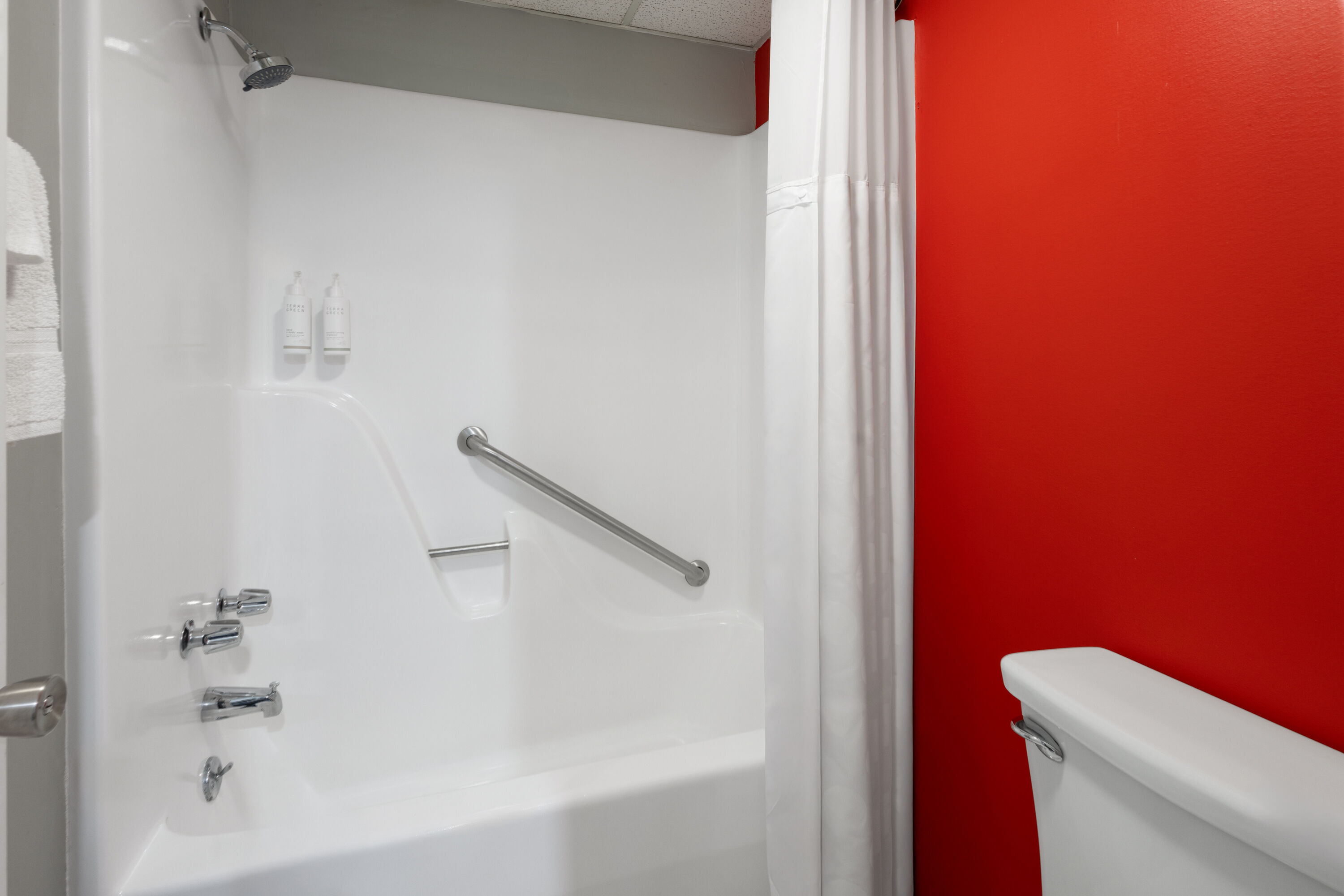 Guest room bath at the Super 8 by Wyndham Hazleton in Hazleton, Pennsylvania