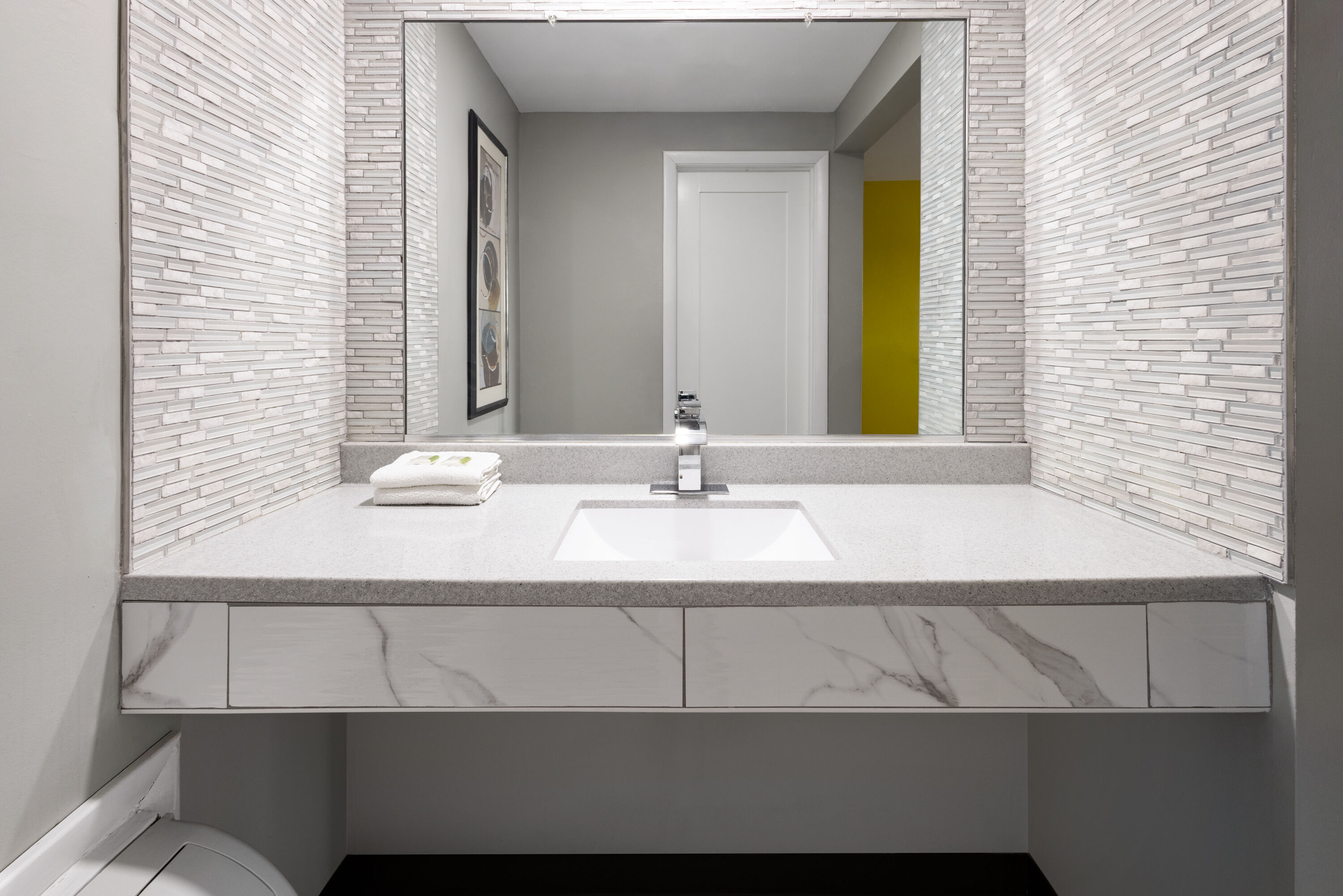 Guest room bath at the Super 8 by Wyndham Hazleton in Hazleton, Pennsylvania