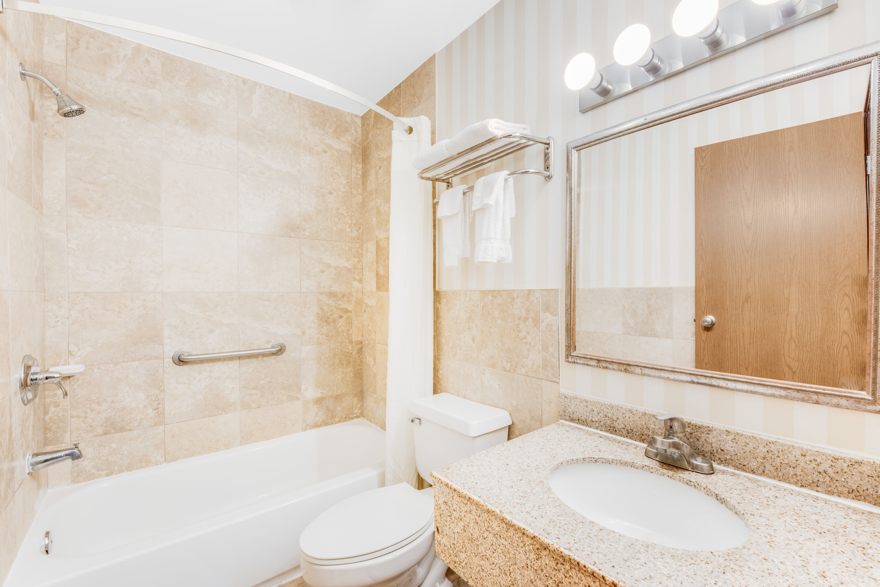 Guest room bath at the Super 8 by Wyndham Kutztown/Allentown Area in Kutztown, Pennsylvania