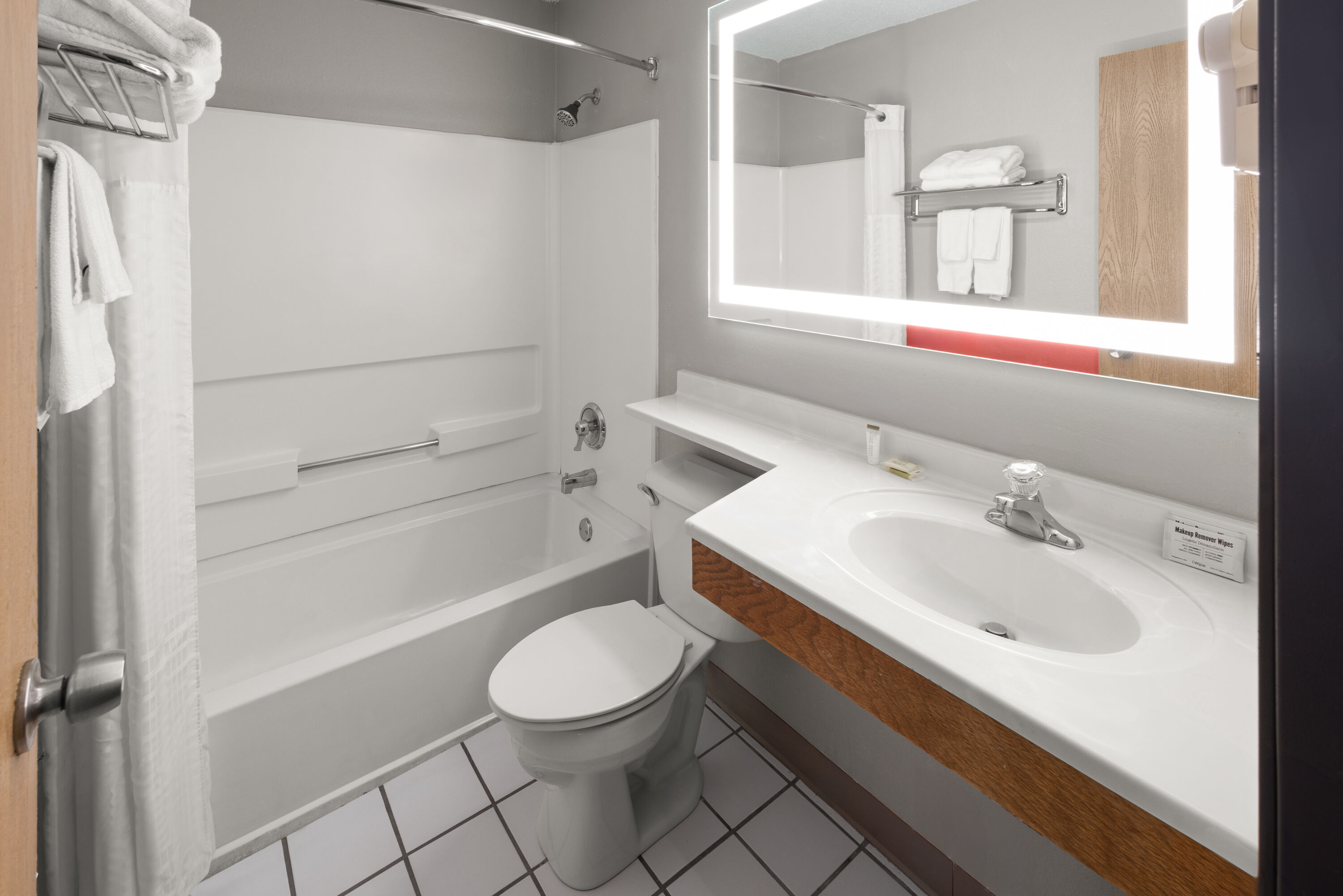 Guest room bath at the Super 8 by Wyndham New Stanton in New Stanton, Pennsylvania