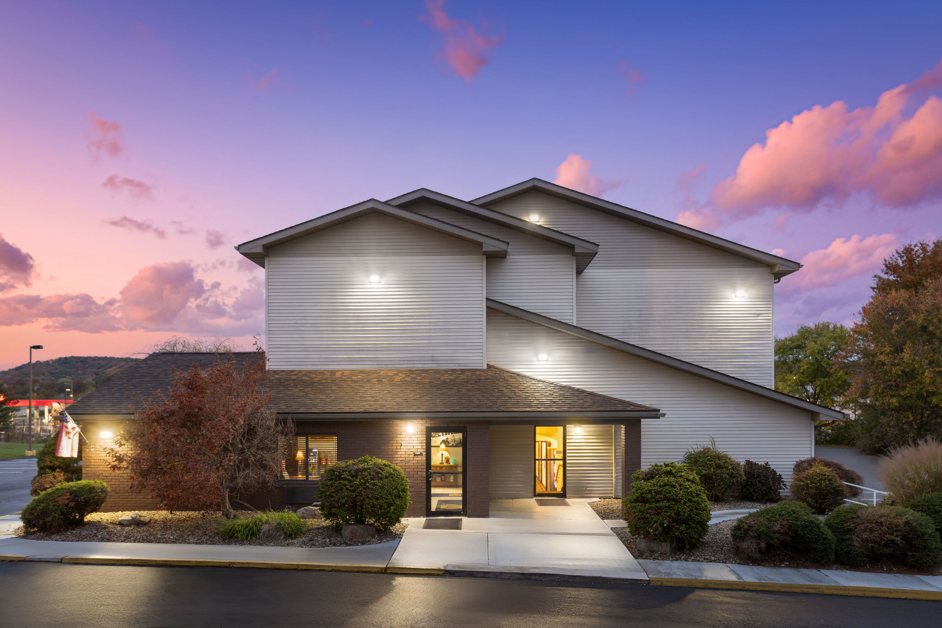 Exterior Dusk Image of Super 8 by Wyndham New Stanton hotel in New Stanton, Pennsylvania