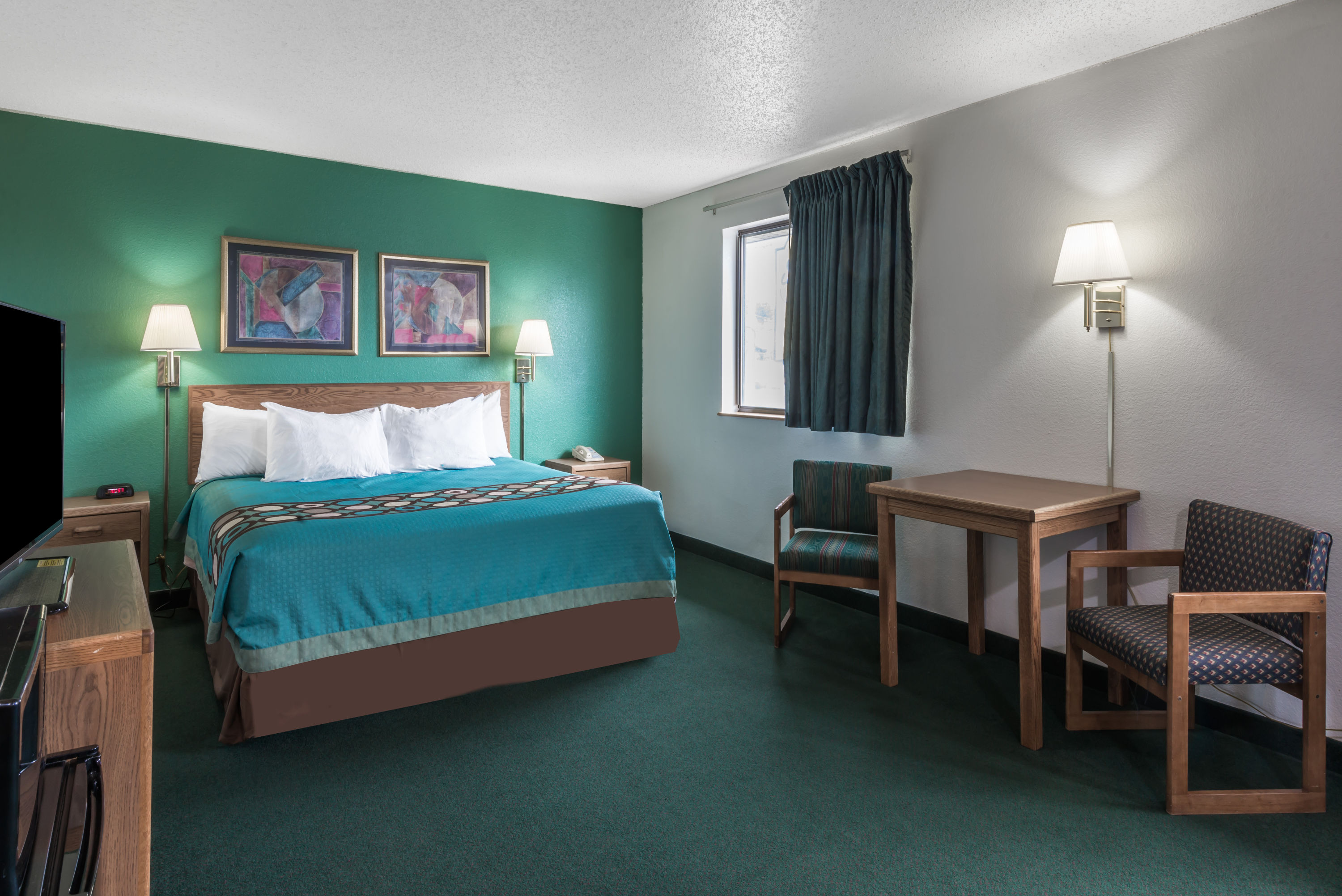 Guest room at the Super 8 by Wyndham New Stanton in New Stanton, Pennsylvania