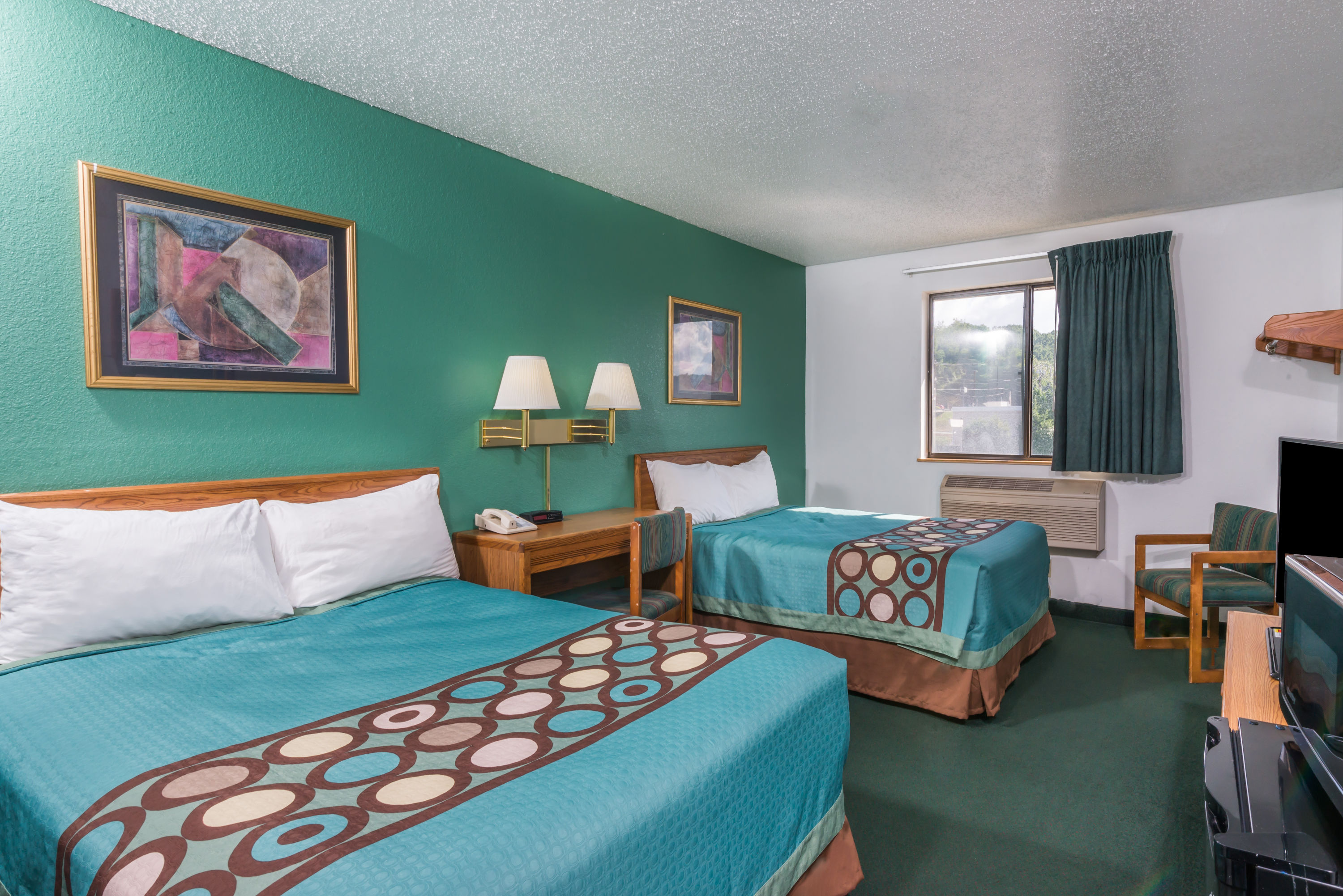 Guest room at the Super 8 by Wyndham New Stanton in New Stanton, Pennsylvania