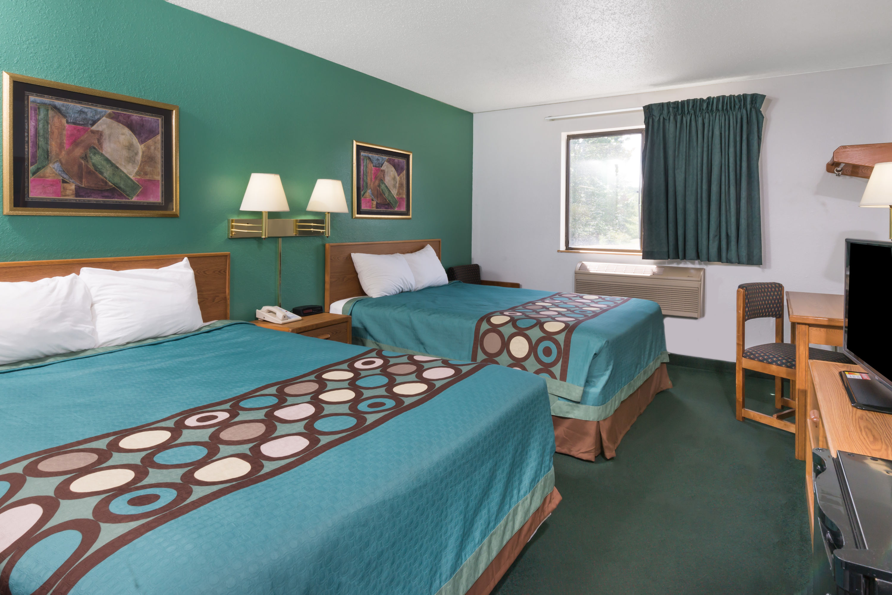 Guest room at the Super 8 by Wyndham New Stanton in New Stanton, Pennsylvania