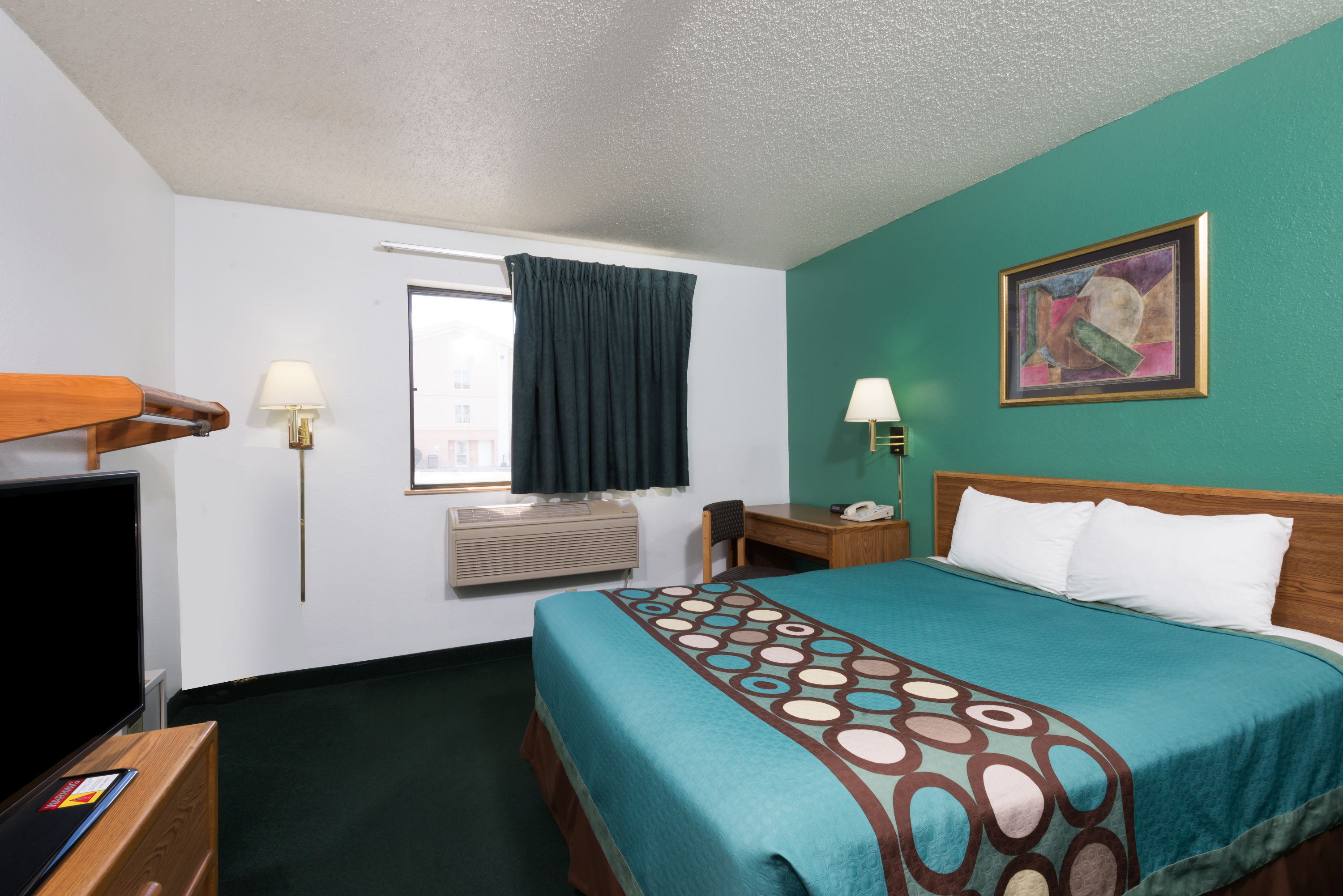 Guest room at the Super 8 by Wyndham New Stanton in New Stanton, Pennsylvania