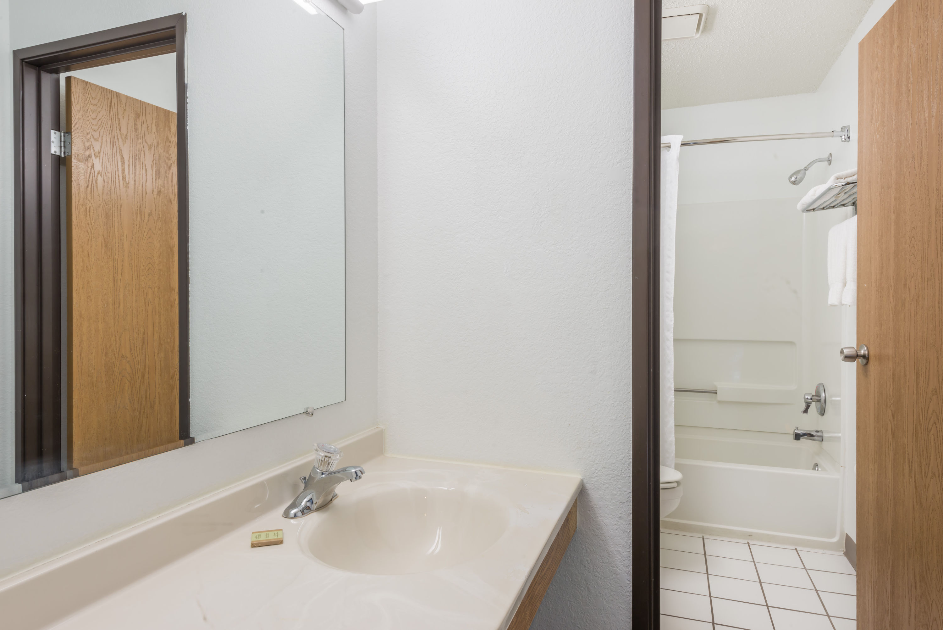 Guest room at the Super 8 by Wyndham New Stanton in New Stanton, Pennsylvania