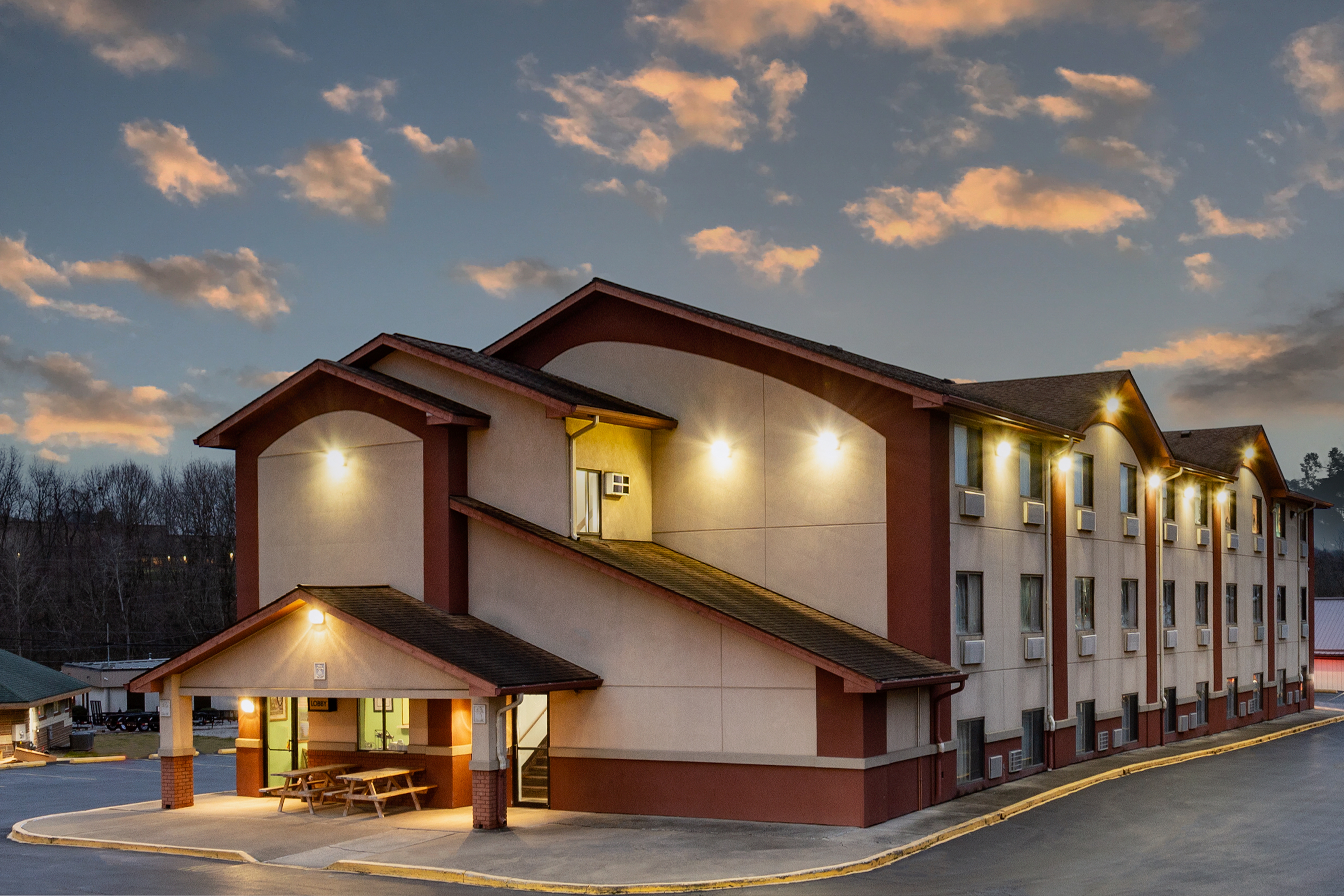 Exterior Dusk Image of Super 8 by Wyndham Waynesburg hotel in Waynesburg, Pennsylvania